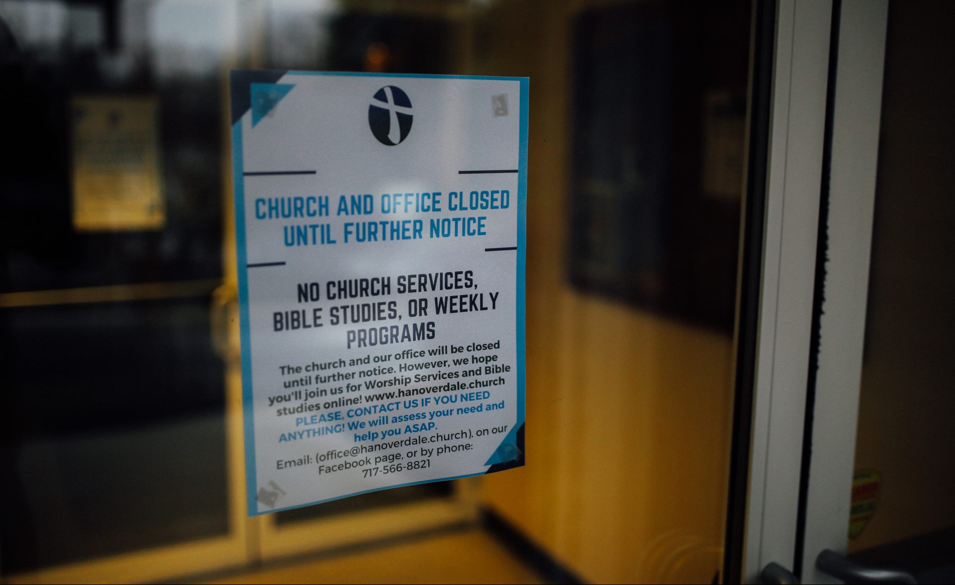 A sign on the Hanoverdale Church of The Brethren in Hummelstown, Pa., shows the church and office are closed until further notice during the coronavirus pandemic and statewide stay-at-home order.