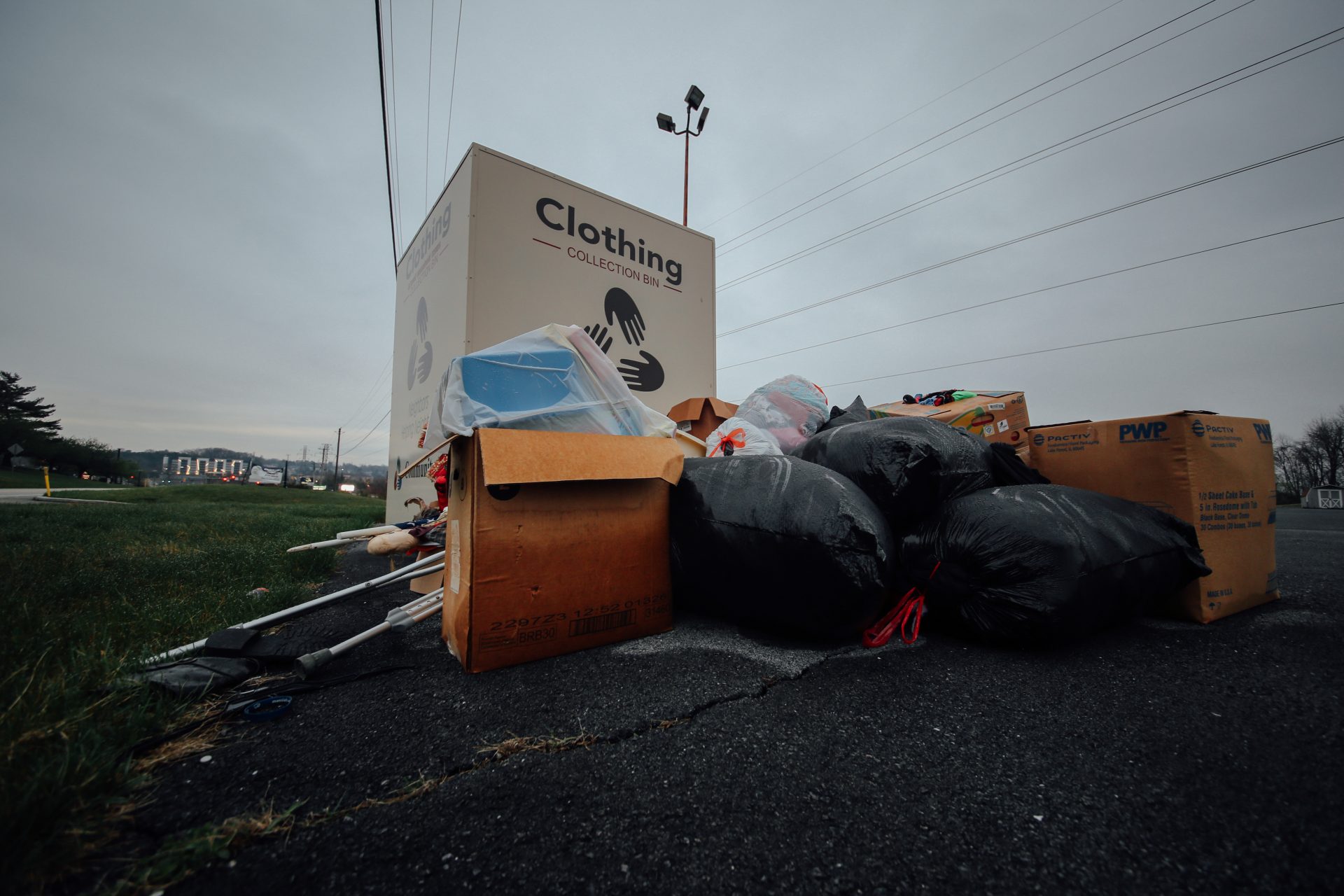 A Community Aid drop-off box is overflowing with donations, because the items aren't being picked up during the coronavirus outbreak. This bin is located in the parking lot of the Swatara Church of God outside Harrisburg.