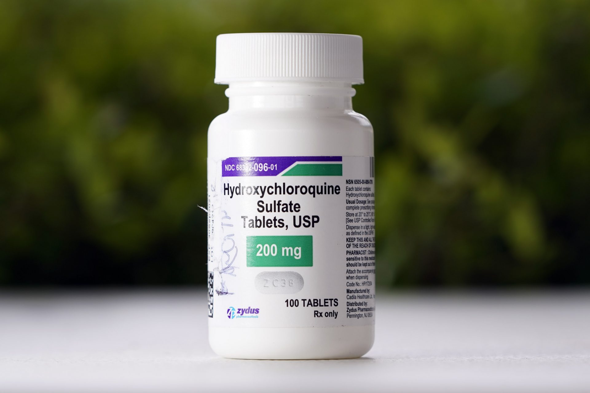 This Tuesday, April 7, 2020 file photo shows a bottle of hydroxychloroquine tablets in Texas City, Texas. On Friday, April 24, 2020, the U.S. Food and Drug Administration warned doctors against prescribing the malaria drug to treat COVID-19 outside of hospitals or research settings.