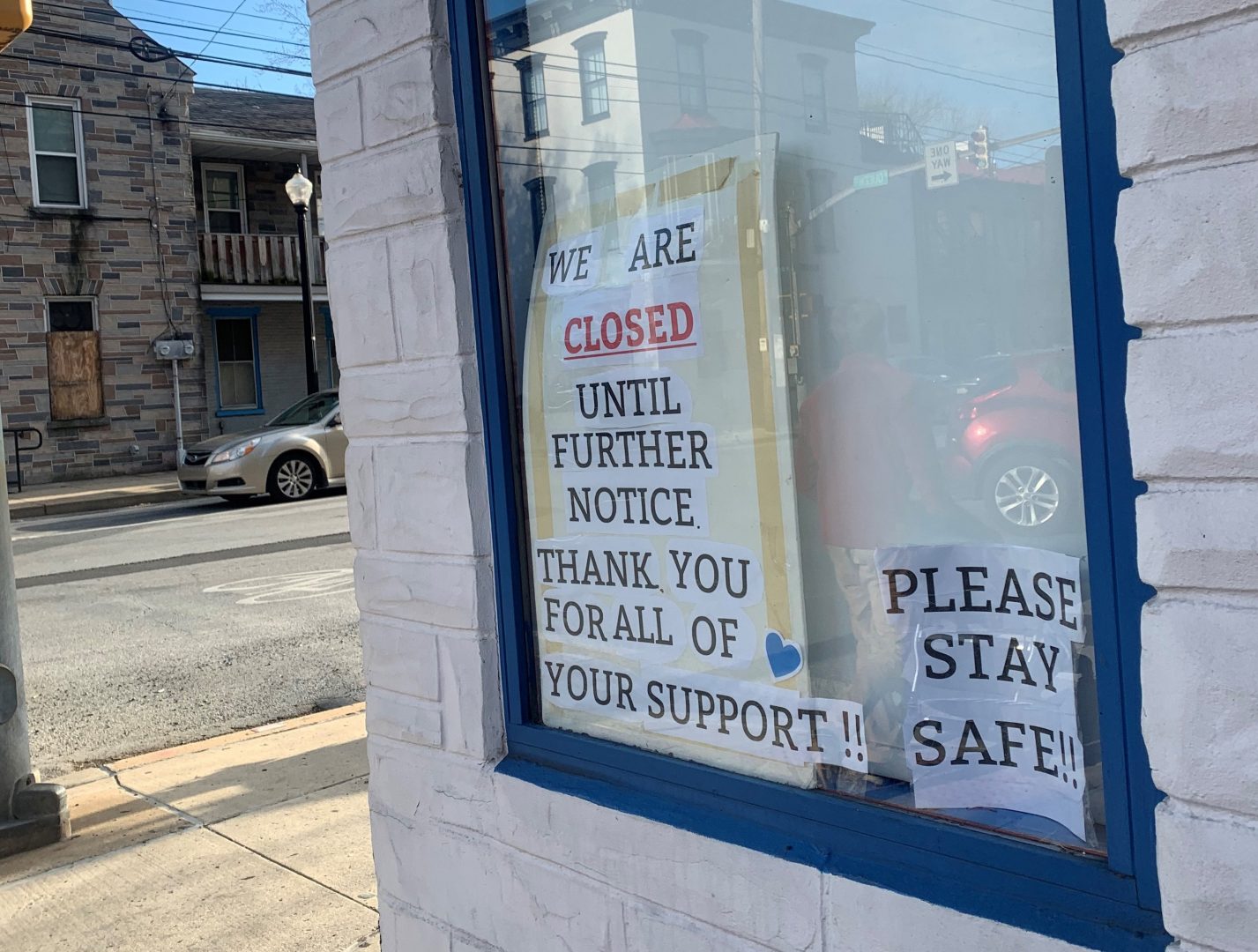A sign hangs in the window of the Souvlaki Boys sandwich shop in Lancaster, Pa. 
