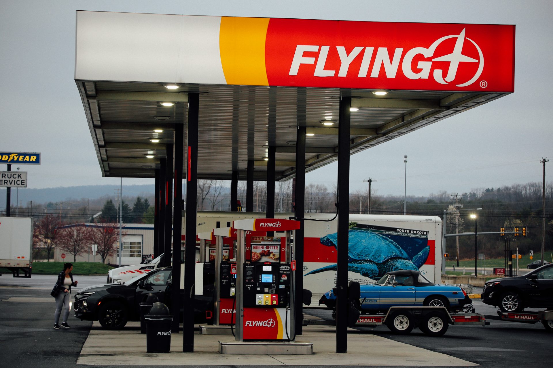 Drivers fill up on gas at a Flying J on April 1, 2020.