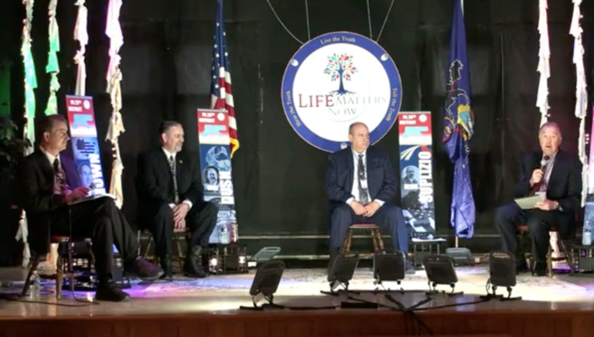 Candidates for the 25th State Senate District, (left to right) Jim Brown, Cris Dush, and John "Herm" Suplizio. Tom Wagner (far right) moderated the event.