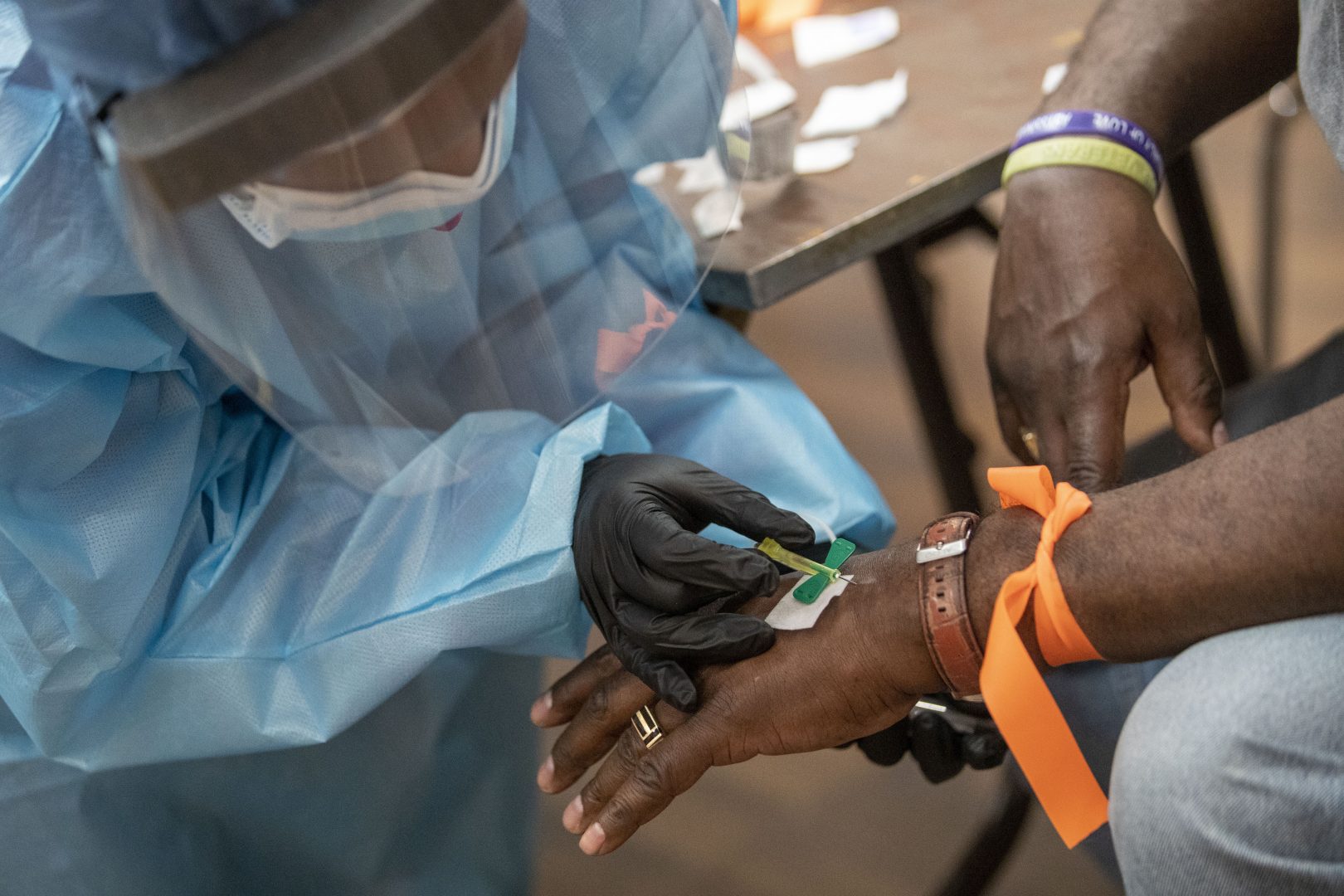 A registered nurse draws blood during a COVID-19 antibody test drive at the Abyssinian Baptist Church, Thursday, May 14, 2020, in the Harlem neighborhood of the Manhattan. Churches in low income communities across New York are offering COVID-19 testing to residents in conjunction with Northwell Health and New York State.