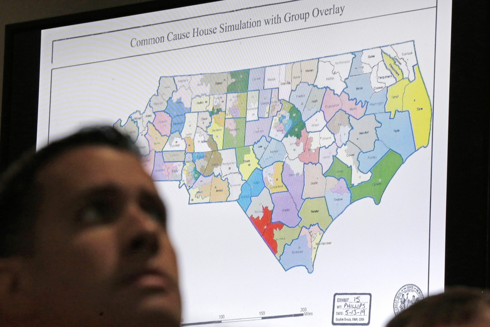 A North Carolina map is shown in Wake County Superior Court during a 2019 redistricting trial. Republicans and Democrats are preparing for a battle of state legislative supremacy that could have a big effect on political power for the next decade.