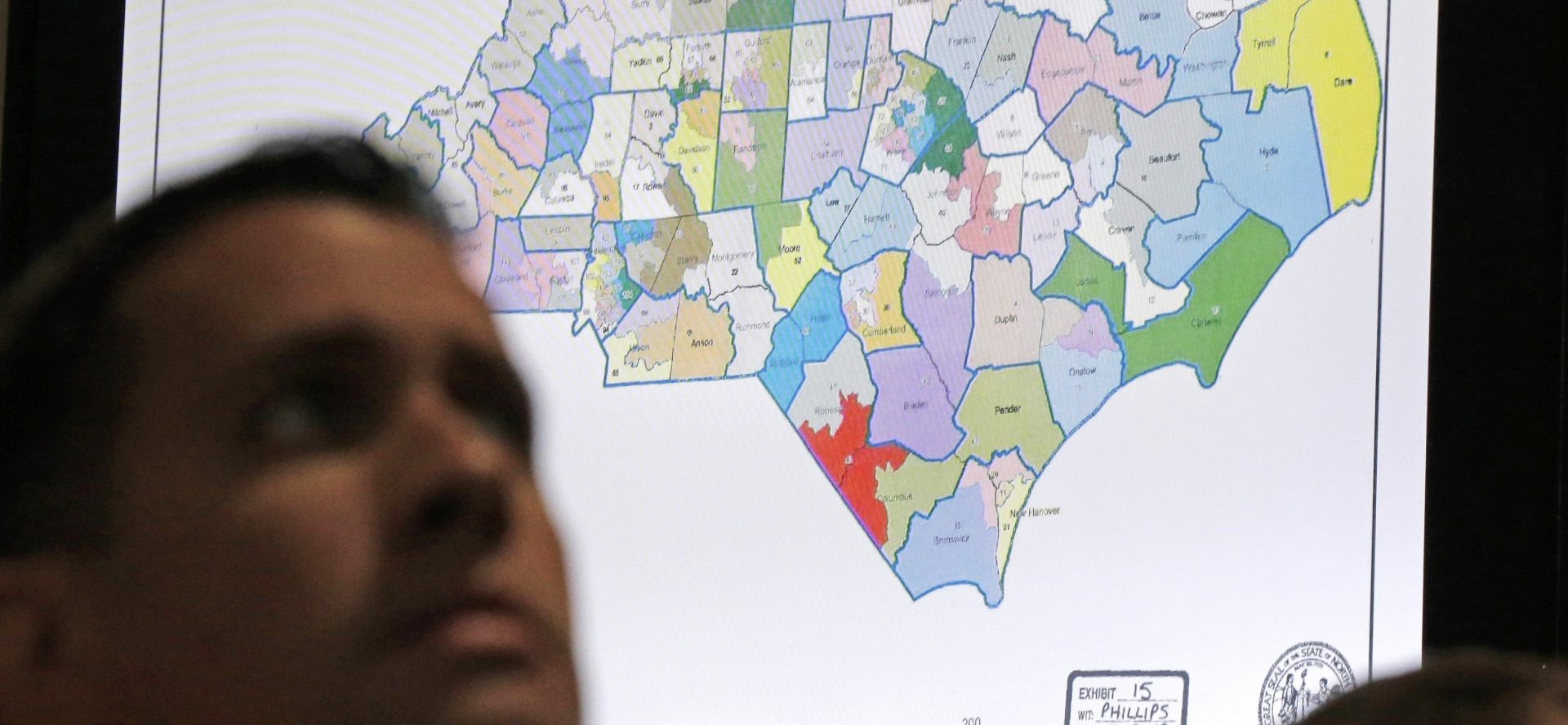 A North Carolina map is shown in Wake County Superior Court during a 2019 redistricting trial. Republicans and Democrats are preparing for a battle of state legislative supremacy that could have a big effect on political power for the next decade.