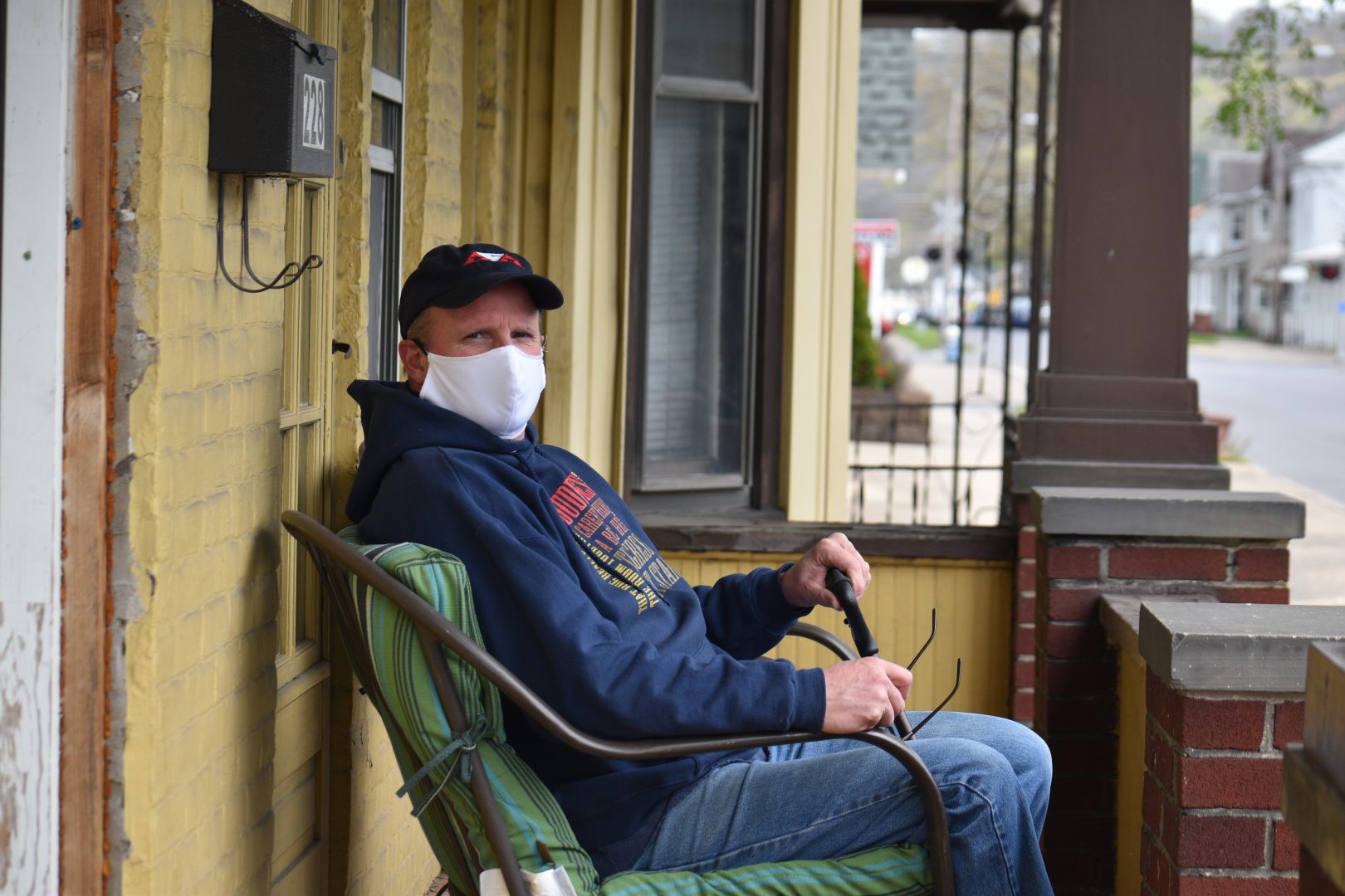 Scott Hoffman sits on his porch in Sunbury, Northumberland County, on April 29, 2020.
