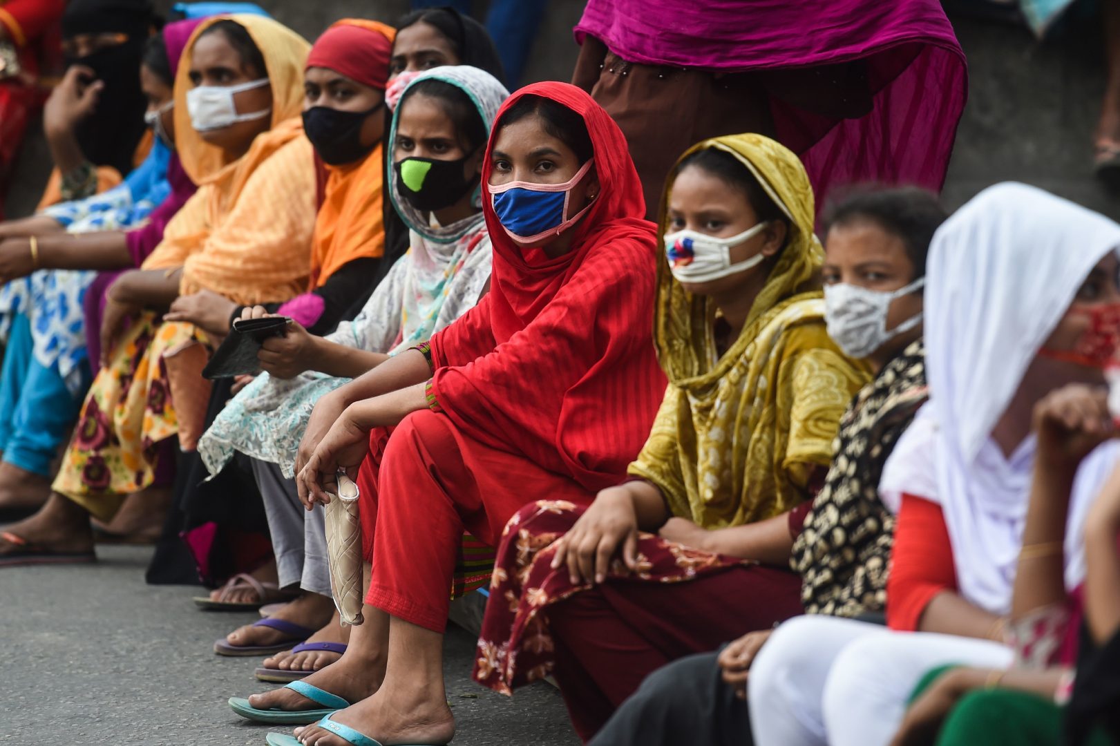 Workers from the garment sector block a road during a protest to demand payment of due wages, in Dhaka, Bangladesh, in April. Thousands of garment workers who produce items for top Western fashion brands protested against unpaid wages, saying they were more afraid of starving than contracting the coronavirus.