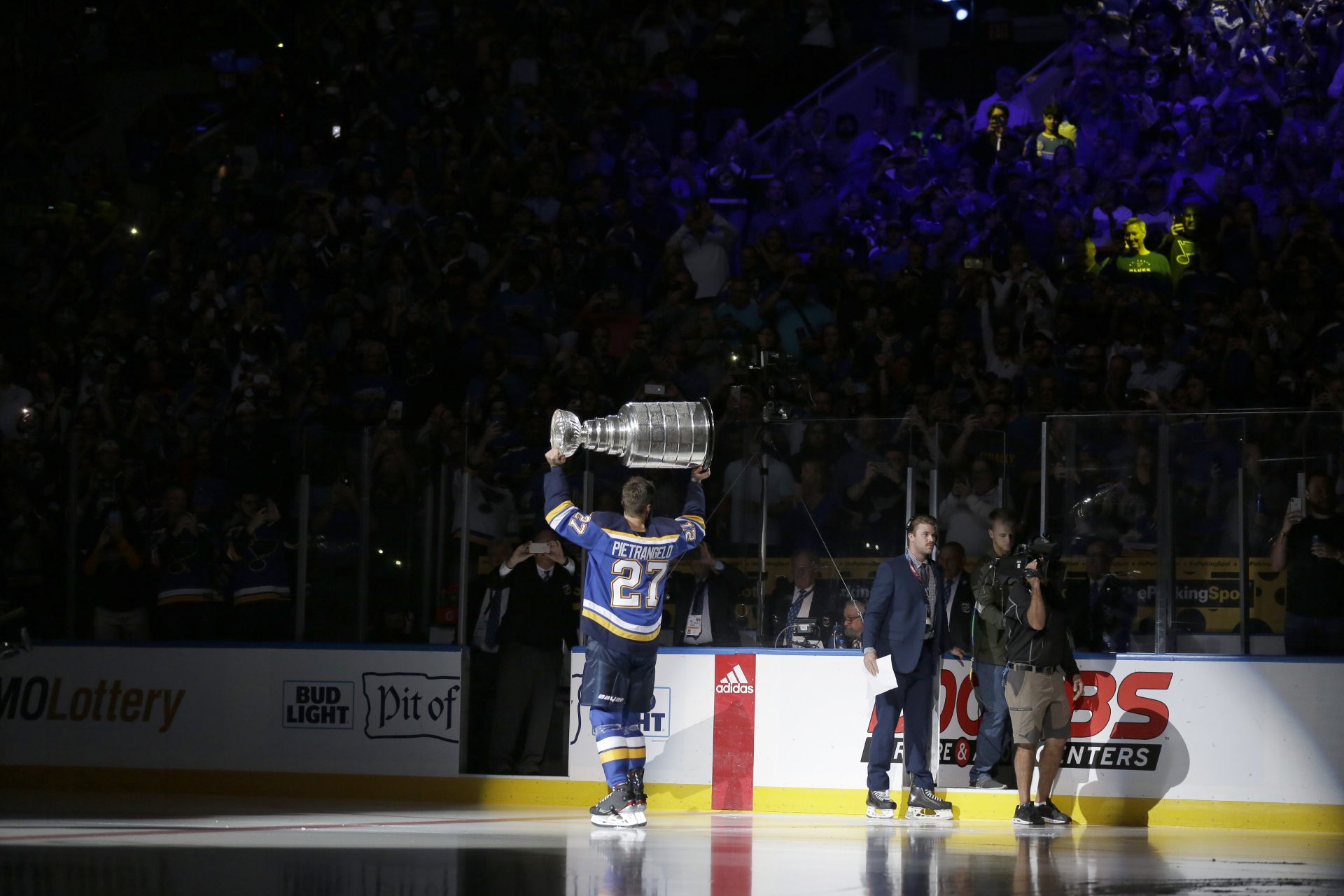 St. Louis Blues captain Alex Pietrangelo lifts the Stanley Cup during a ceremony honoring the Blues championship victory before the start of an NHL hockey game against the Washington Capitals Wednesday, Oct. 2, 2019, in St. Louis. The Blues defeated the Boston Bruins last season to win the Stanley Cup.