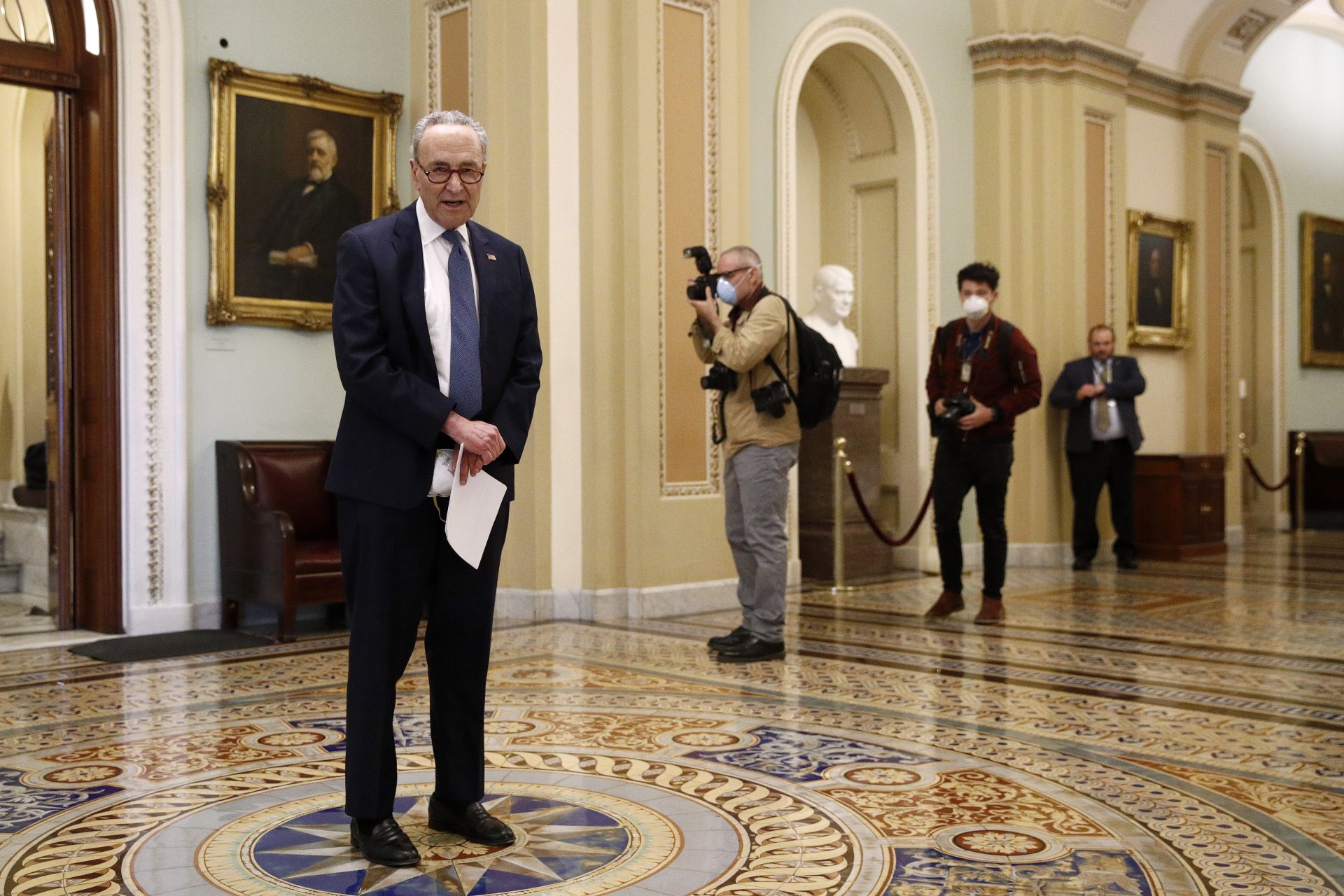 In this April 21, 2020, file photo Senate Minority Leader Sen. Chuck Schumer of N.Y. speaks with reporters outside the Senate chamber on Capitol Hill in Washington. The Senate is set to resume Monday, May 4.