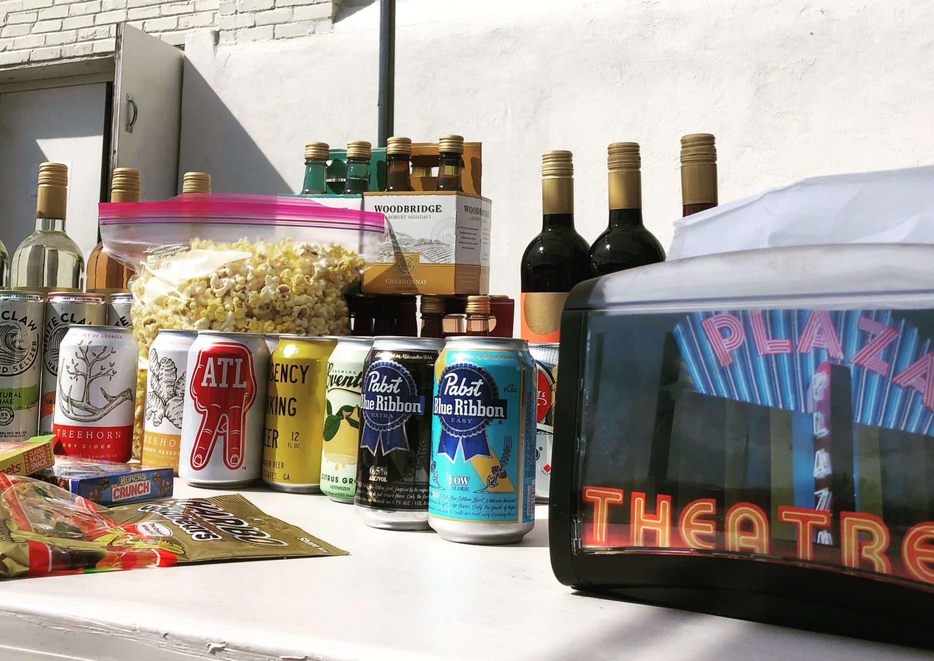 Atlanta's Plaza Theatre is offering concessions to-go (above), Movie-Night Care Packages for first-line pandemic workers, VIP private screenings for first responders, and is working on a contactless pop-up drive-in experience in the parking lot.