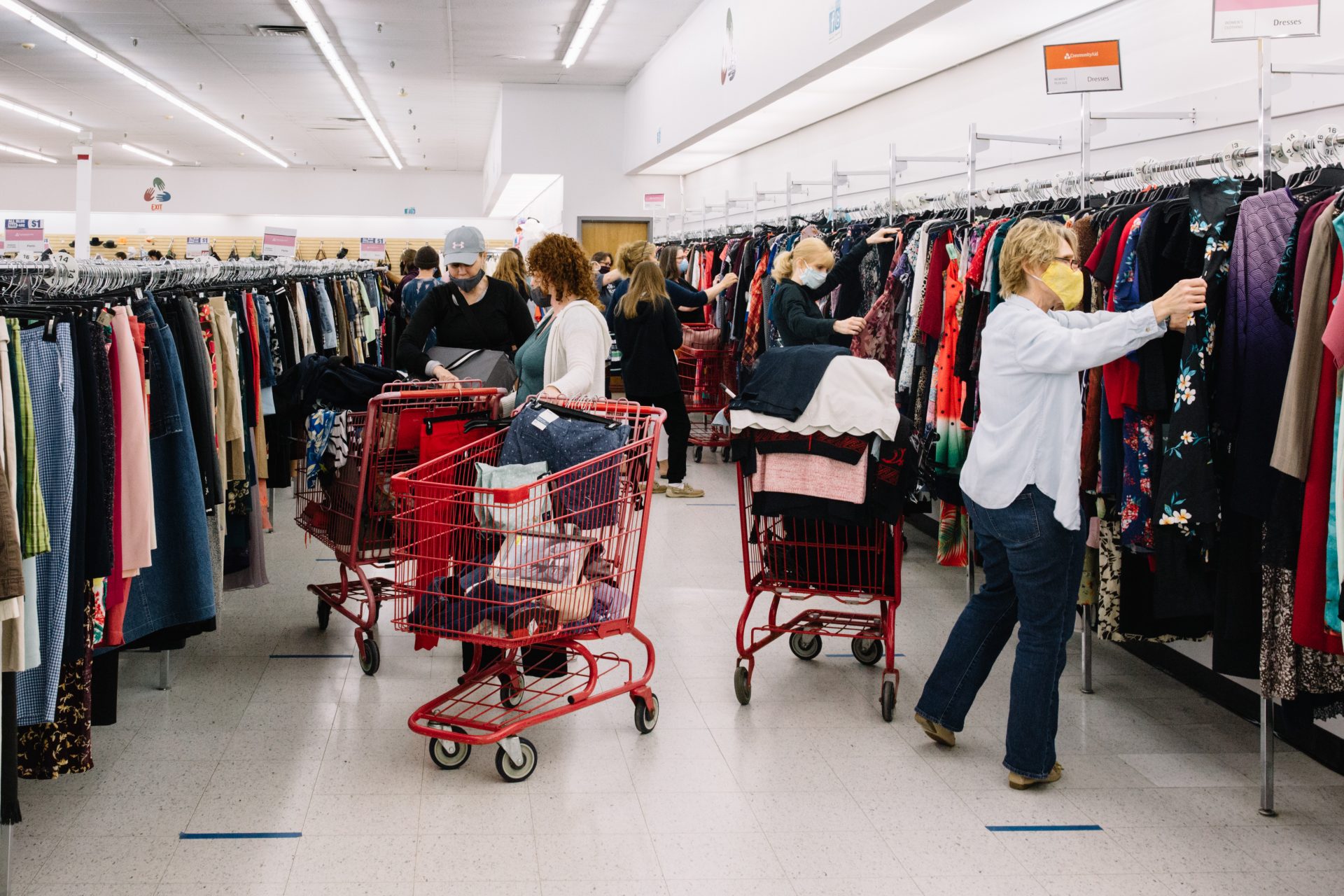 Shoppers line the aisles at Community Aid thrift store in Mechanicsburg on Friday, May 22, the day Cumberland County entered the yellow phase of reopening.