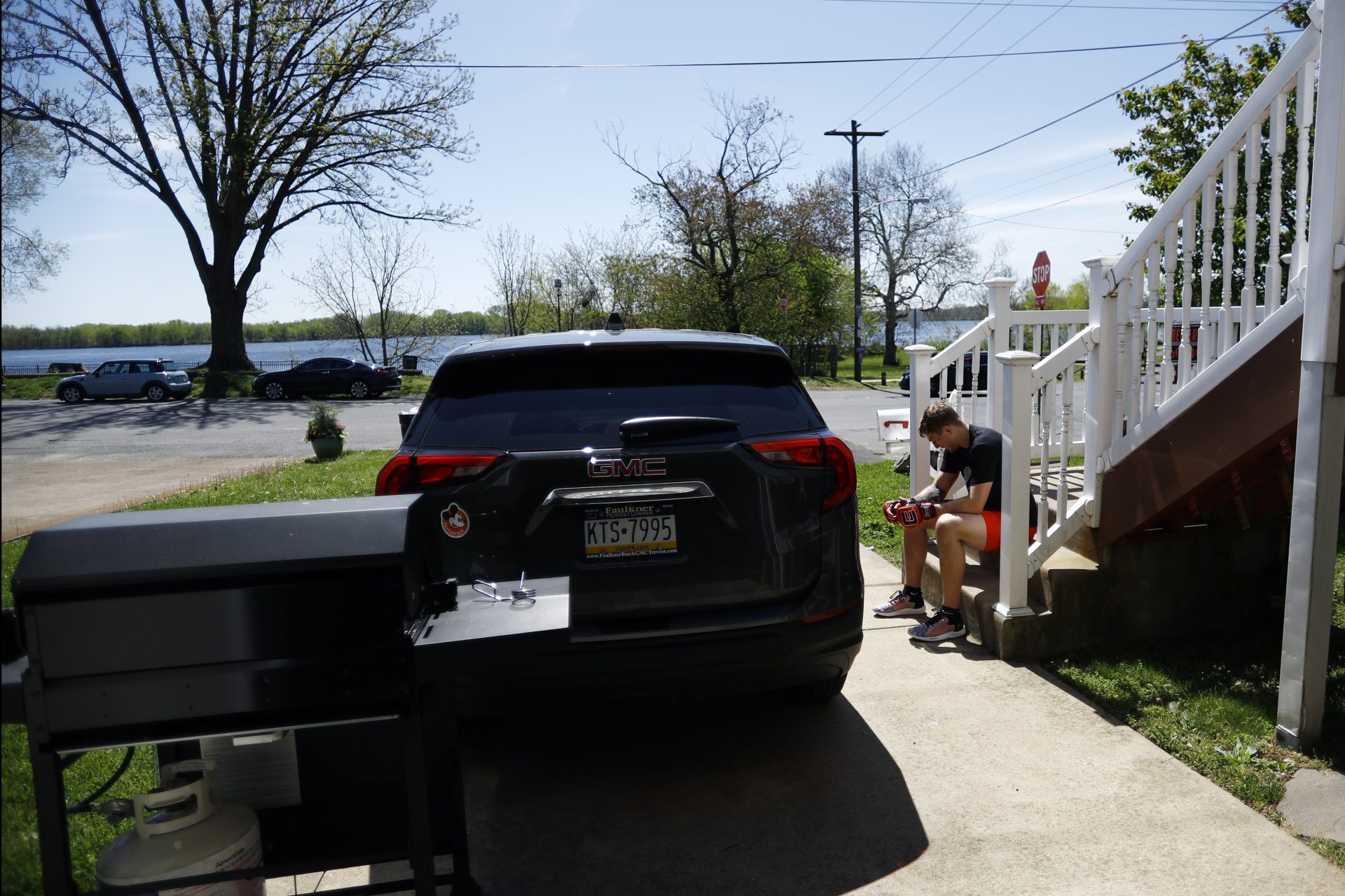 Fighter Kyle Daukaus rests between training session outside his home, Saturday, May 2, 2020, in Philadelphia. Daukaus, a rising star in the regional MMA promotion Cage Fury Fighting Championships, is still chasing his dream of getting the call to fight for UFC despite the coronavirus pandemic.