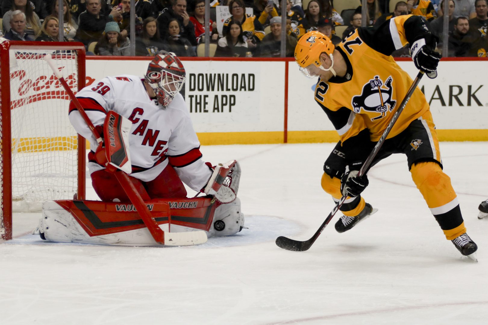 Carolina Hurricanes goaltender Alex Nedeljkovic (39) makes a see on Pittsburgh Penguins' Patric Hornqvist (72) during the second period of an NHL hockey game, Sunday, March 8, 2020, in Pittsburgh.