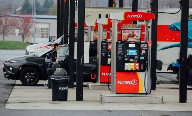 Drivers fill up on gas at a Flying J on April 1, 2020.