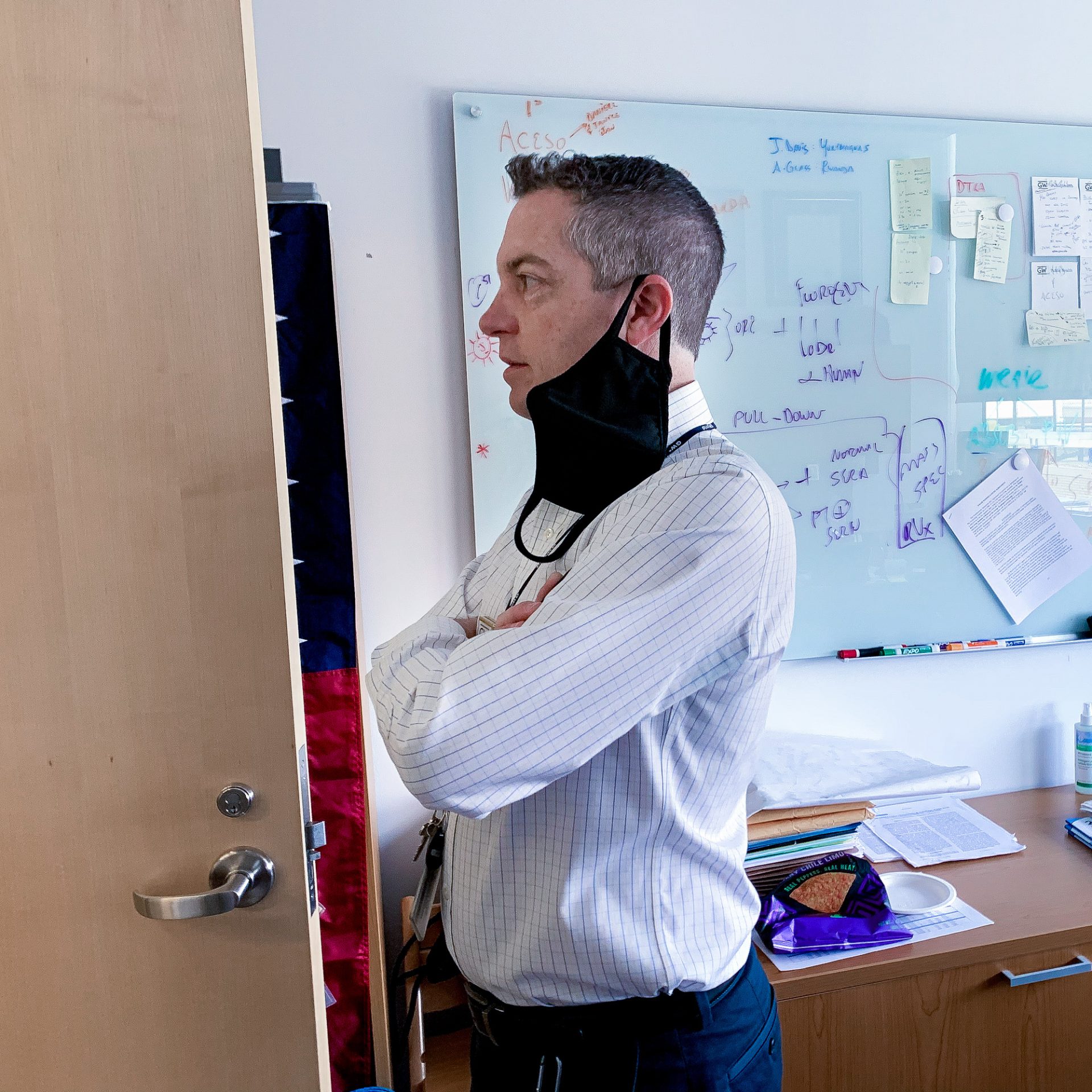 Christopher Mores in his office at the Milken Institute School of Public Health at George Washington University.