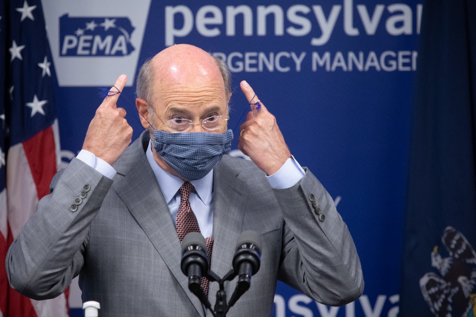 Pennsylvania Governor Tom Wolf removes his mask before answering questions from the press. Harrisburg, PA — June 8, 2020