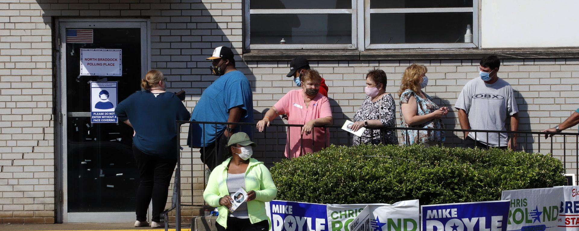 Voters wait in line to vote in the Pennsylvania Primary outside the North Braddock Municipal Building in Braddock, Pa., Tuesday, June 2, 2020.