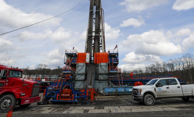 FILE—In this file photo from March 12, 2020, work continues at a shale gas well drilling site in St. Mary's, Pa. 