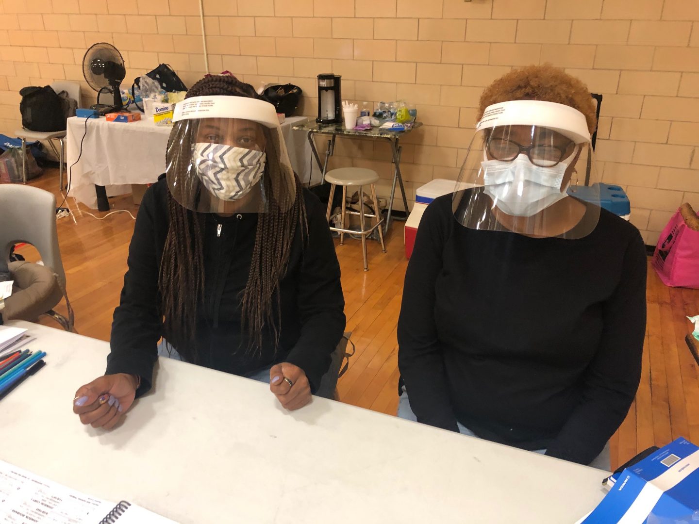 Poll workers at the 1st Ward/1st precinct in Harrisburg, Pa. wear face masks and shields to protect them against coronavirus during voting in the June 2, 2020, primary election.