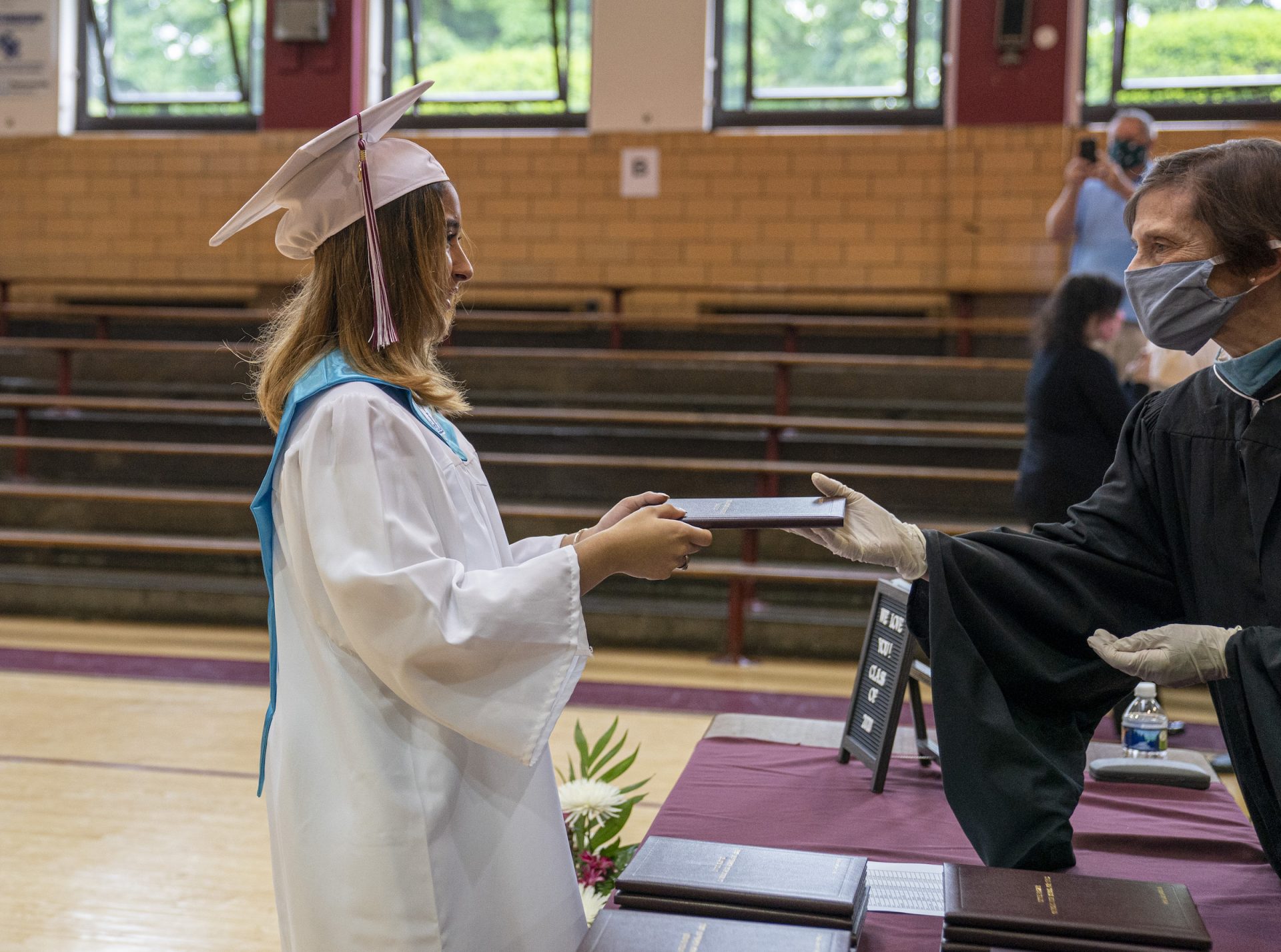 Ashley receives her diploma on graduation day at Little Flower Catholic School for Girls in Hunting Park.
