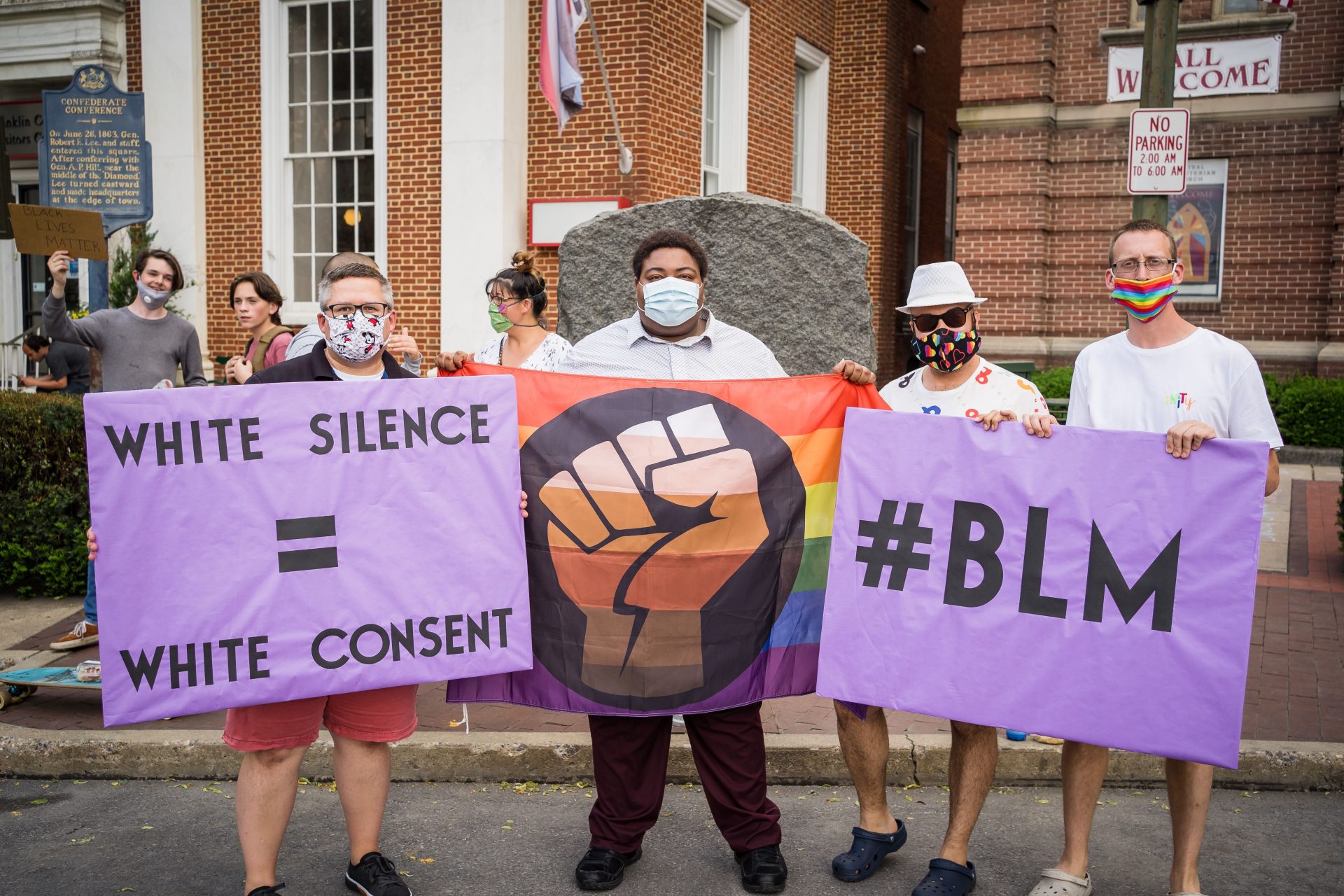 Left to right: Nathan Strayer, Brice Williams, Phillip Whitley and Preston Cook participate in a protest in downtown Chambersburg on June 3.