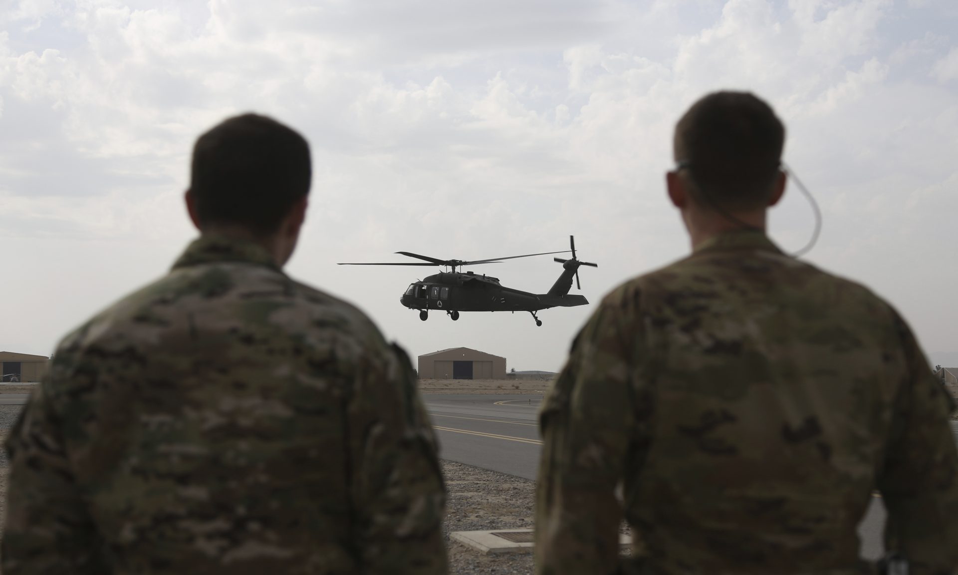 In this Monday, March 19, 2018 photo, a UH-60 Black Hawk helicopter carrying US advisers and Afghan trainees takes off at Kandahar Air Field, Afghanistan. The U.S. military has been flying UH-60 Black Hawk helicopter missions in Afghanistan for years, but the storied aircraft will soon take to the country’s battlefields manned by pilots and crews from the Afghan military.