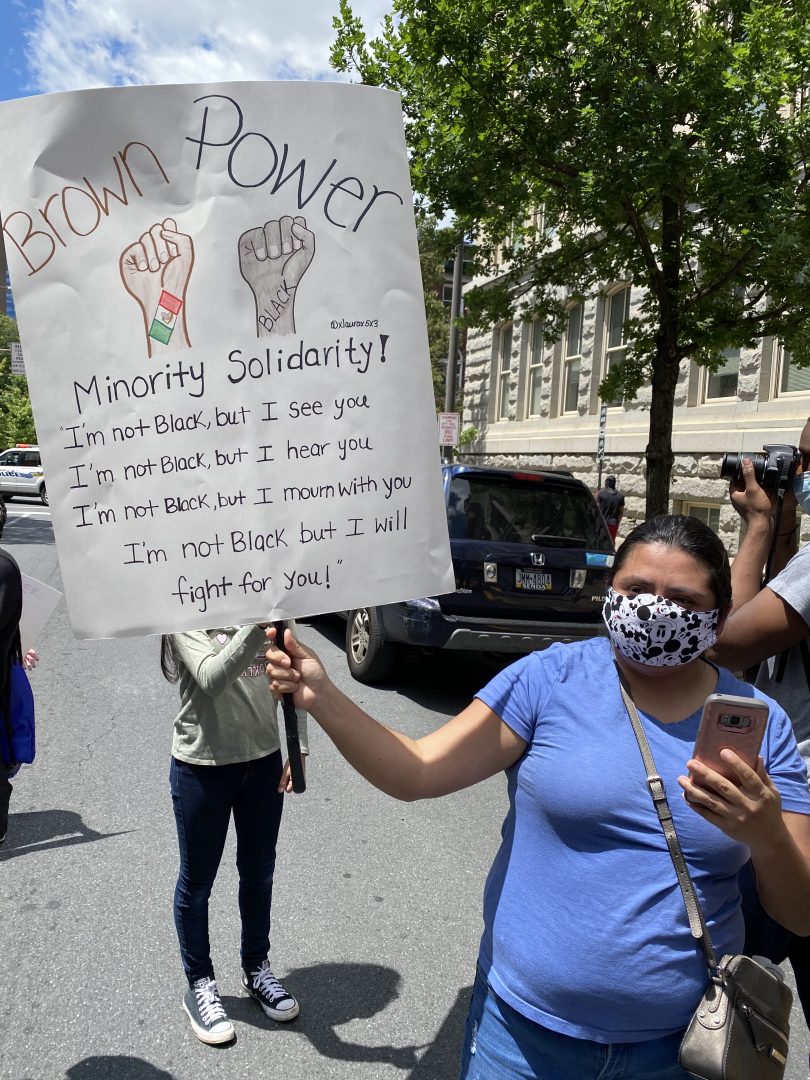 A protestor at Reading’s Black Lives Matter march in May 2020 was one of several who held signs expressing unity between Latinos and Black people.