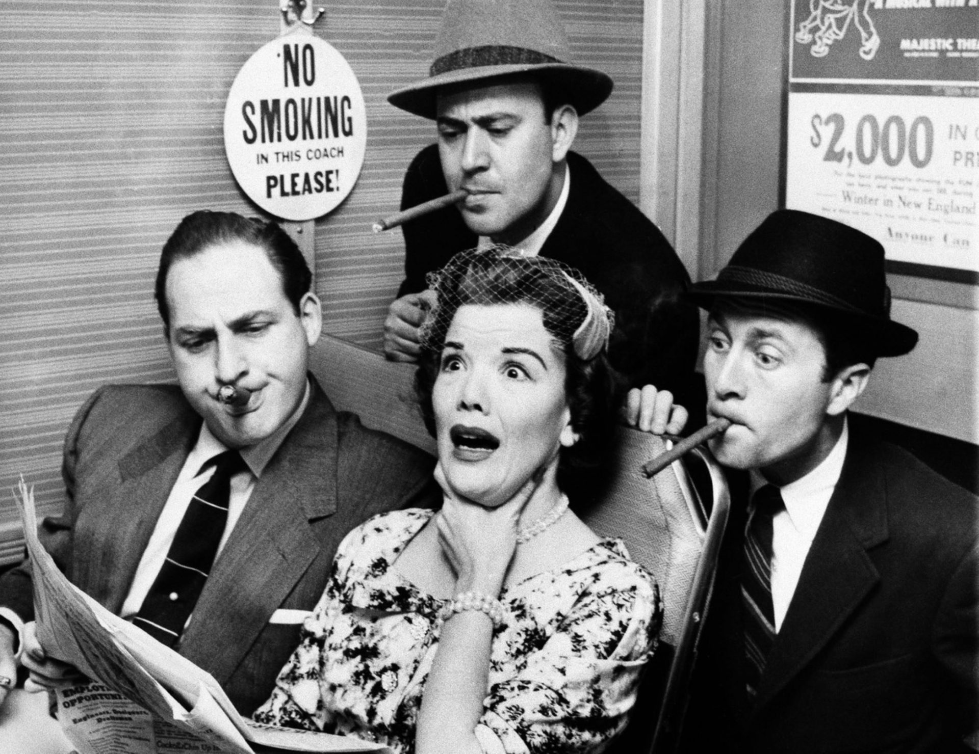 Reiner, top center, Sid Caesar, left, and Howard Morris, right, bother railroad commuter Nanette Fabray on an episode of the sketch comedy show Caesar's Hour in 1955.