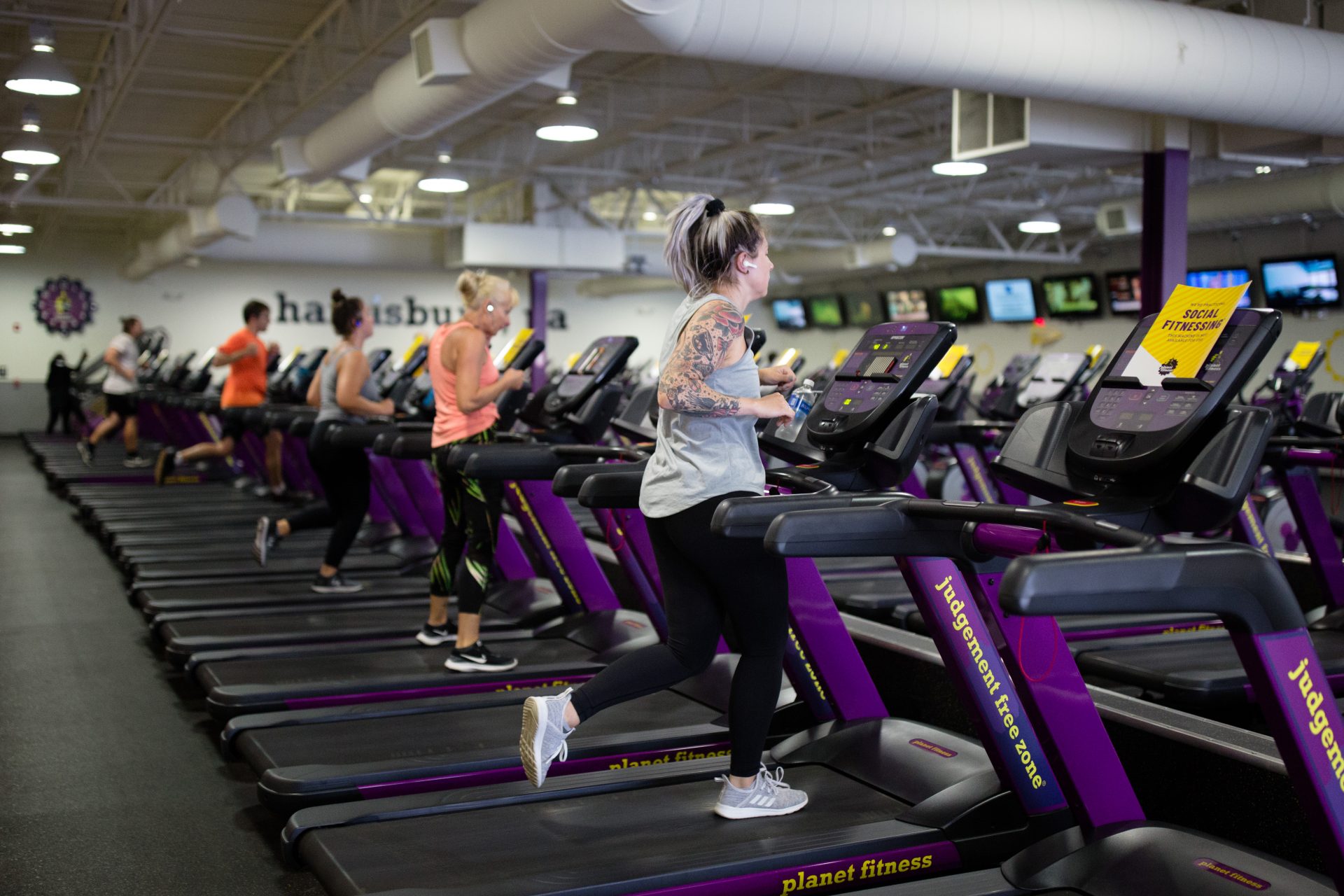 People exercise on treadmills at the Planet Fitness along Allentown Boulevard in Harrisburg on June 19, 2020. As the gym reopened to customers, it blocked off half the treadmills to maintain distance between patrons.