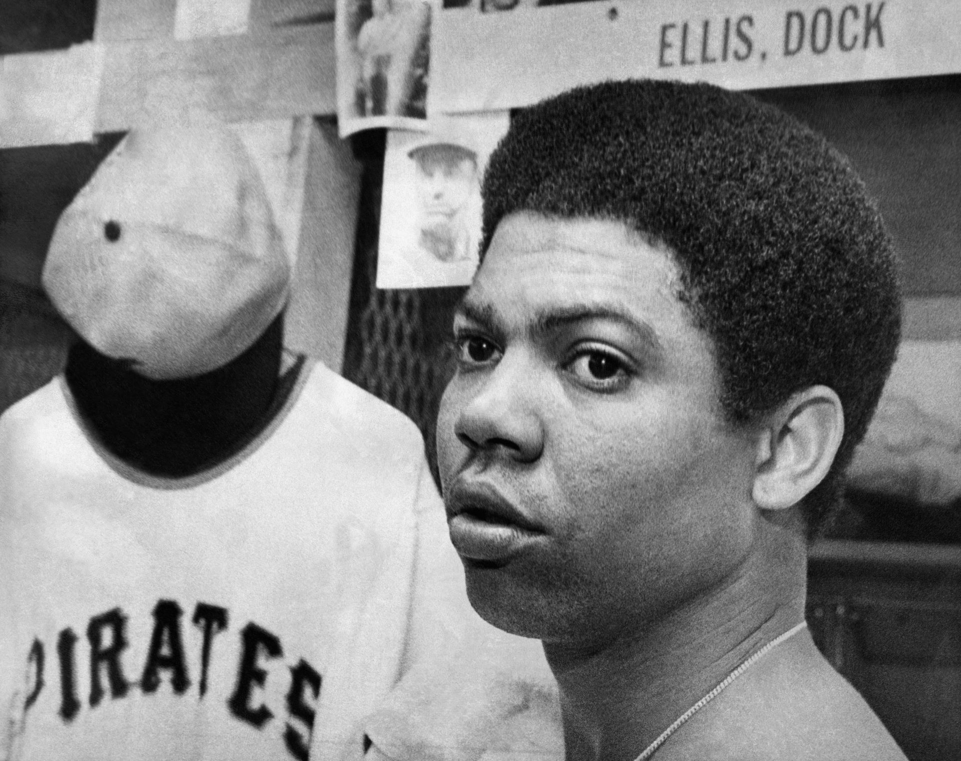 Pittsburgh Pirates Pitcher Dock Ellis, stands by his locker in the Pirates dressing room as he tells newsmen the Pirates management doesn't deserve a winner, Oct. 4, 1971, Pittsburgh, Pa. 