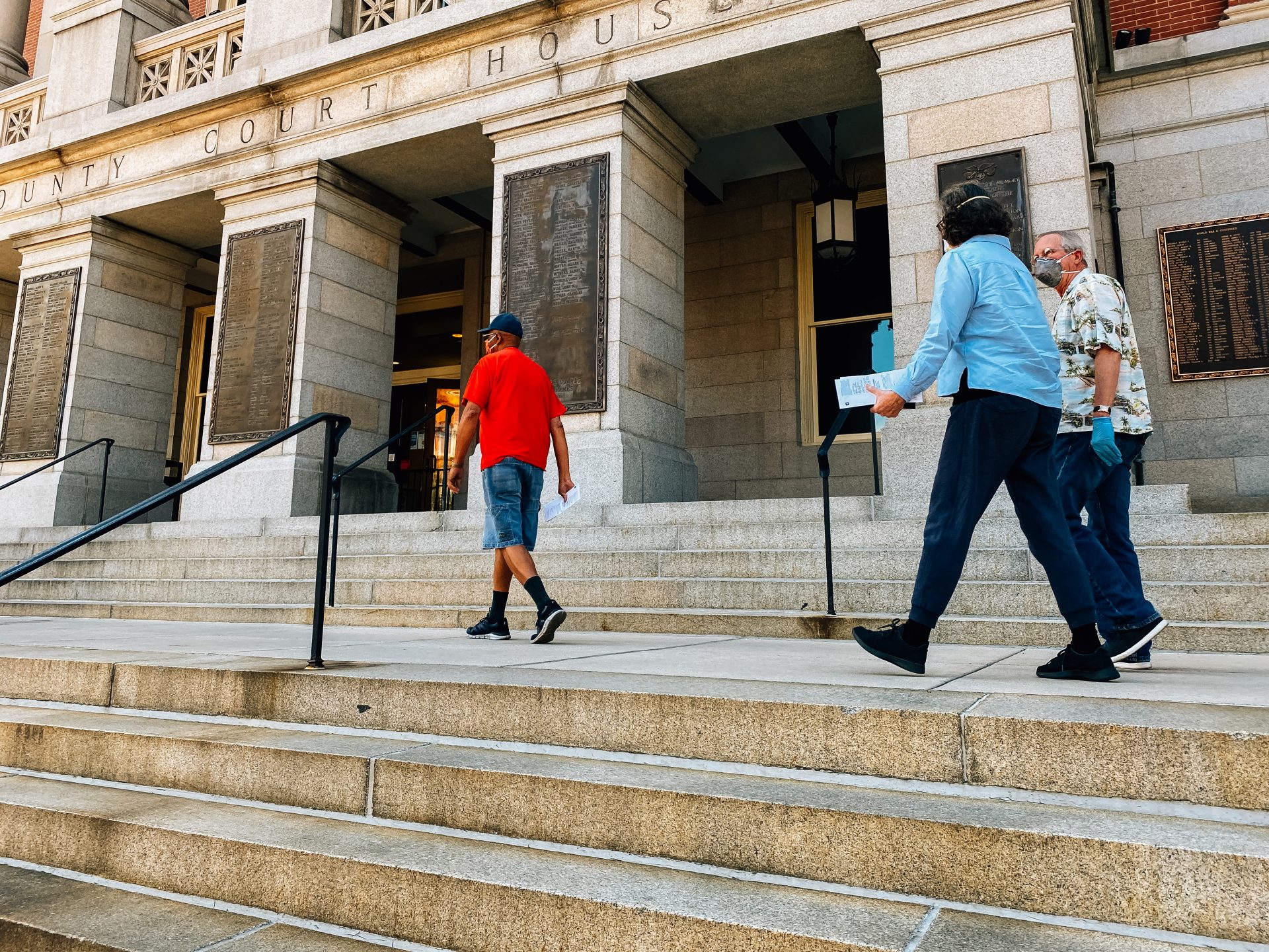 Voters walk along the steps of the York County Courthouse on June 1, 2020, to deposit their ballots in a drop box ahead of the Pennsylvania primary.