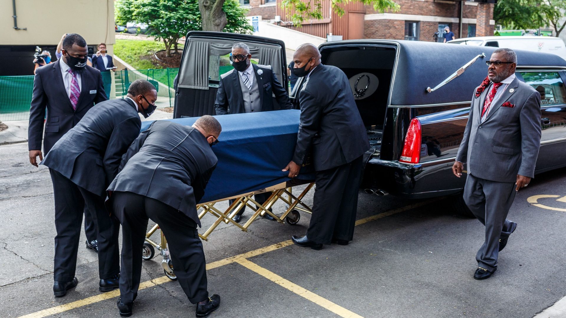 Floyd's remains are taken to the memorial service Thursday in Minneapolis.