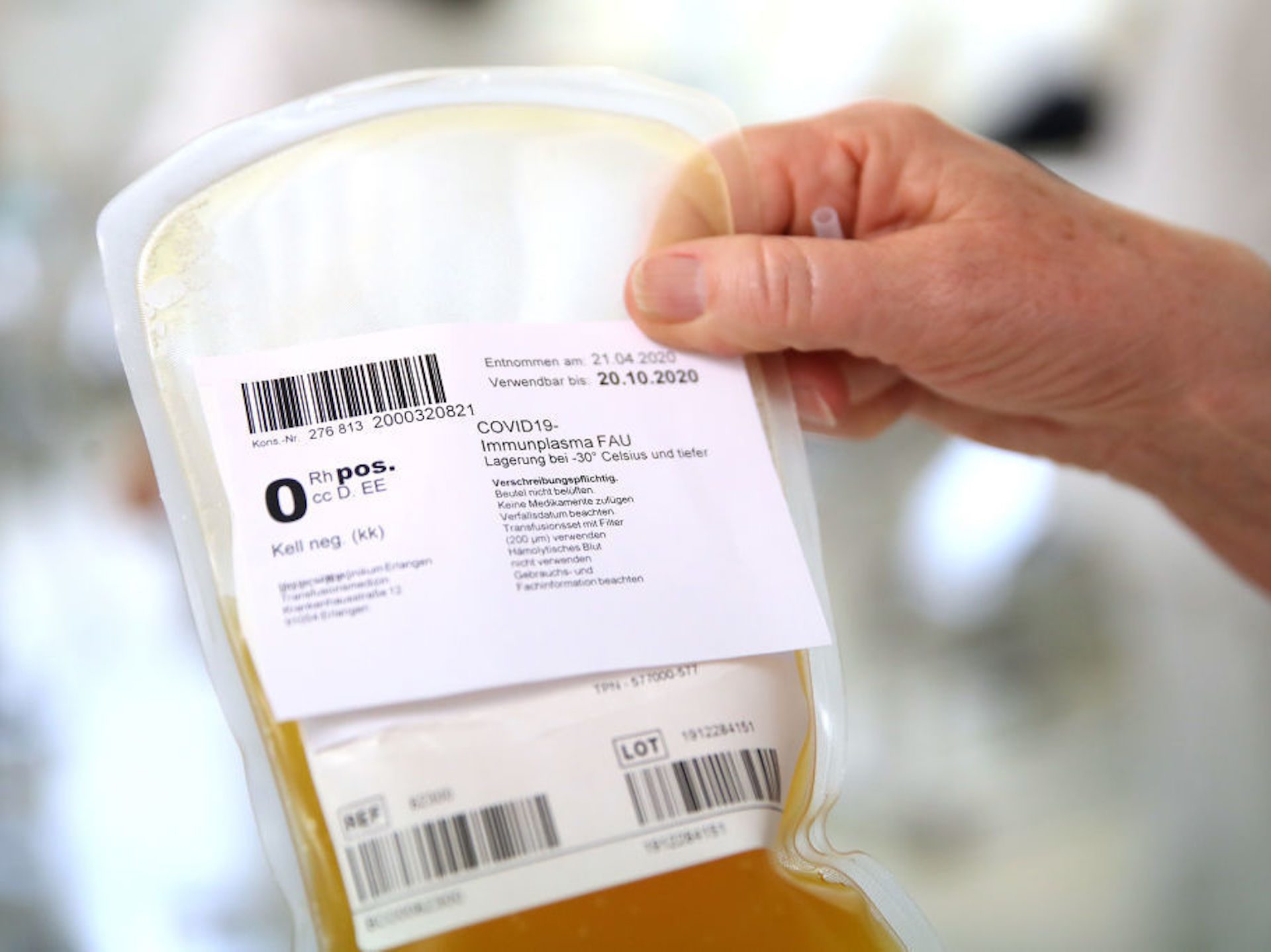 A researcher at the German Center for Immunity Therapy holds a bag containing blood plasma from a recovered COVID-19 patient at the University Hospital Erlangen on April 27, 2020 in Erlangen, Germany. This plasma could be used to treat people with COVID-19.