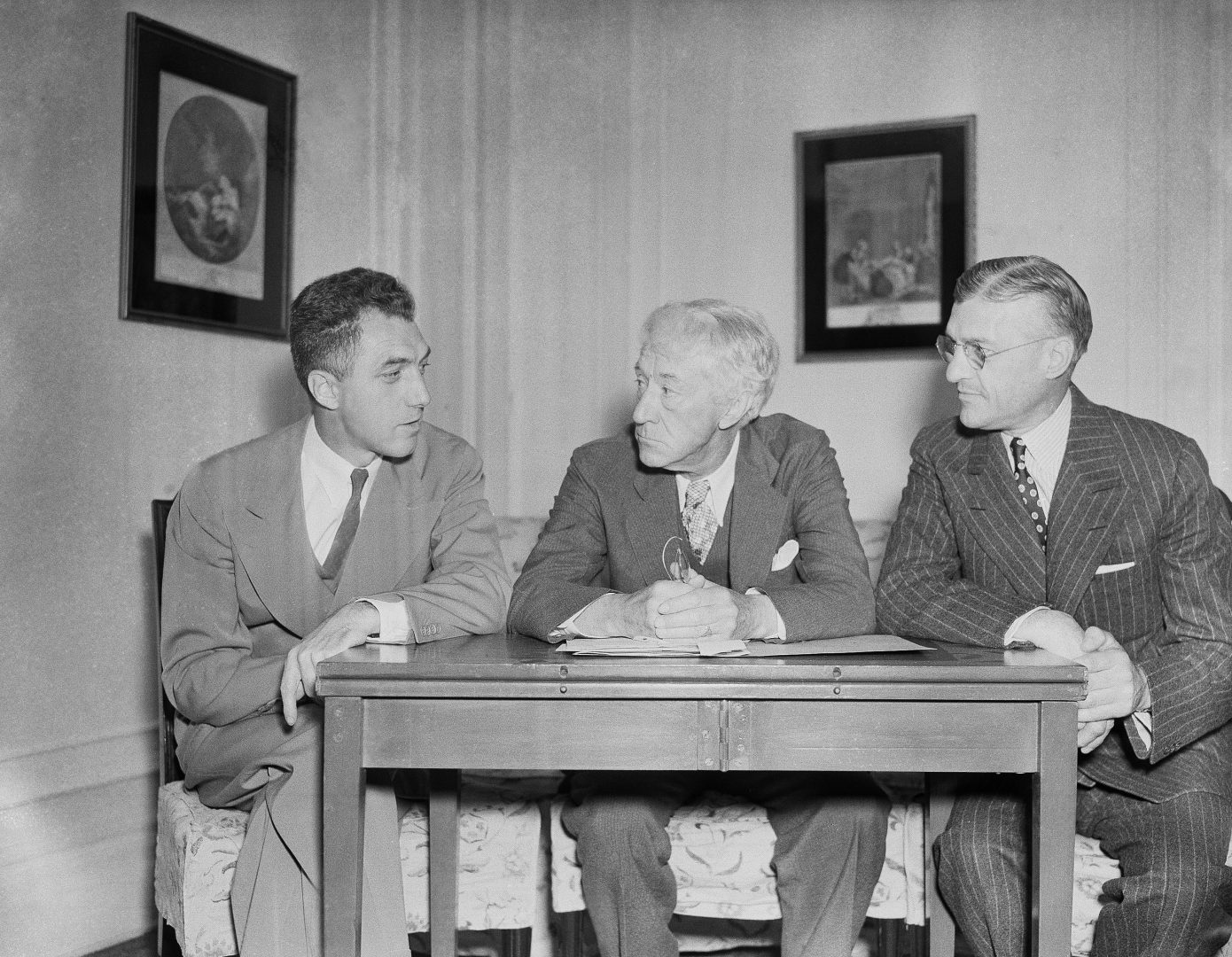 Here for the All Star Baseball Game, the Big Three of baseball confer on last minute details in Boston on July 6, 1936. Left to right: Ford Frick, President of the National League; Judge Kenesaw Mountain Landis, High Commissioner of Baseball; and William Harridge, President of the American League. 