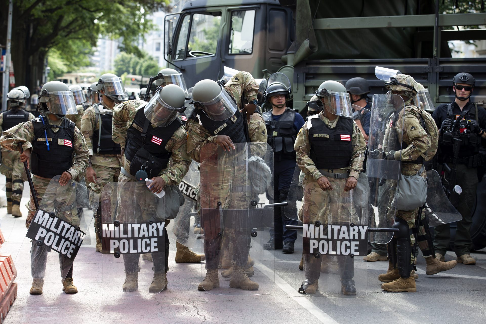 Military police secure a perimeter near to the White House, Wednesday, June 3, 2020 in Washington, during a protest over the death of George Floyd, an unarmed black man, who died after a police officer kneeled on his neck for several minutes.