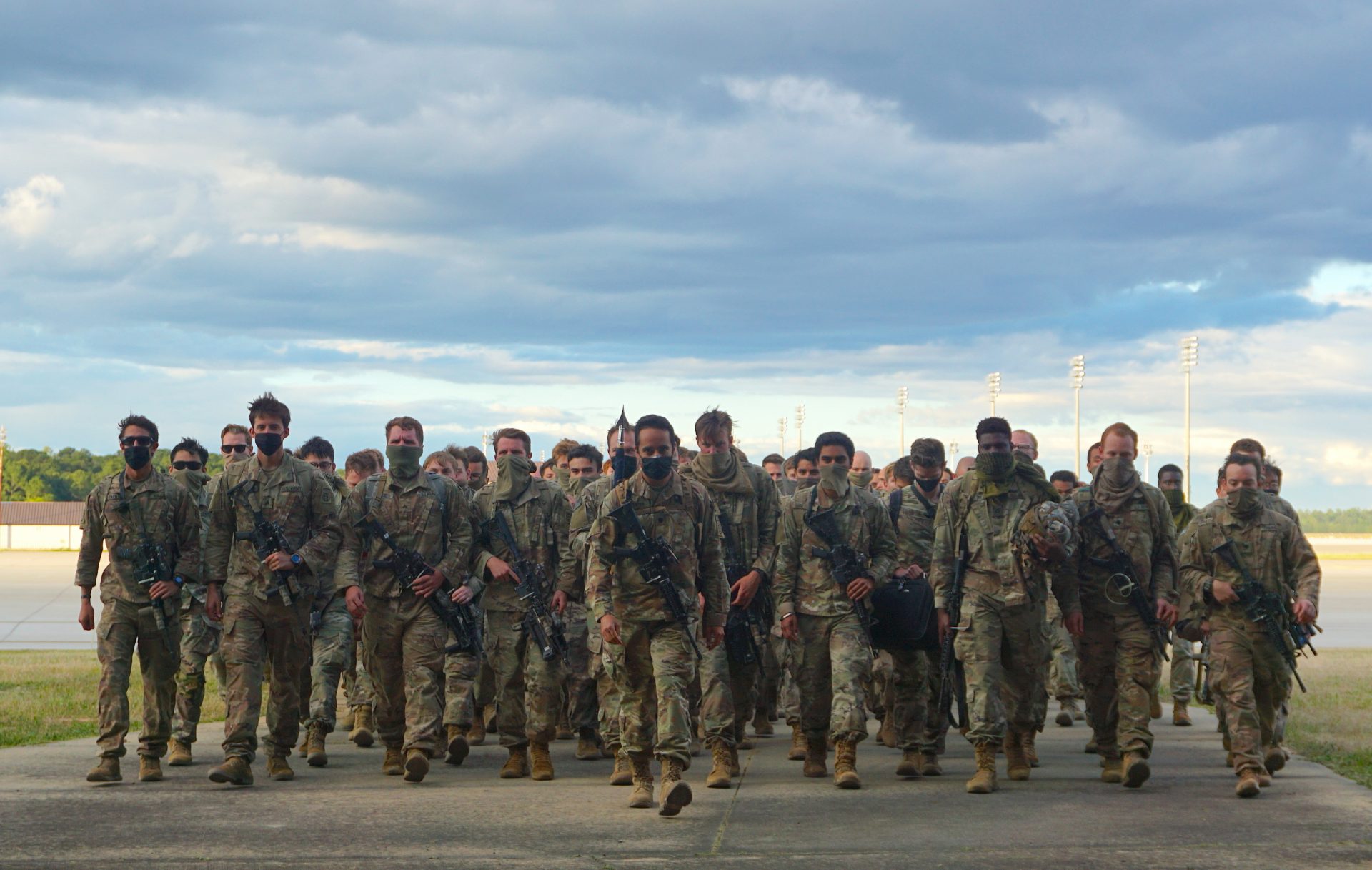 In this photo provided by the U.S. Army, members of Fort Bragg's 82nd Airborne Division's Immediate Response Force return Friday, May 1, 2020, at Pope Army Airfield, in North Carolina. The paratroopers suddenly deployed in January amid rising tensions with Iran.