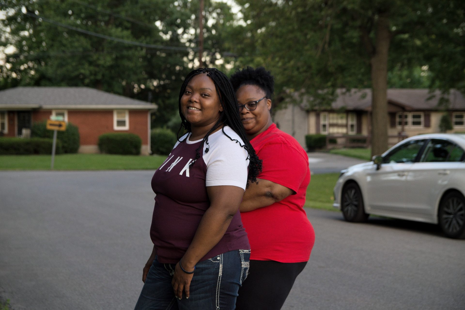 Bianca Austin (left) and Tahasha Holloway, both aunts to Taylor, stand outside Austin's home in Louisville, Ky. They're grateful that Taylor's name and story have become known nationwide. "But we don't want this at all," Austin said. "We want her back."