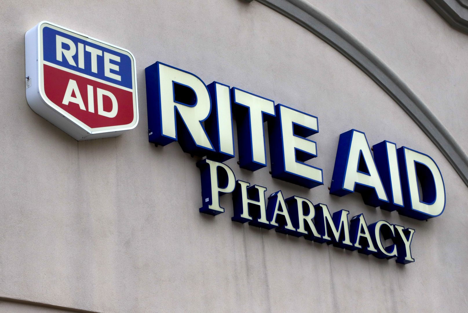 This is the sign on a Rite Aid Pharmacy in Pittsburgh, Pa., Tuesday, April 14, 2020. 