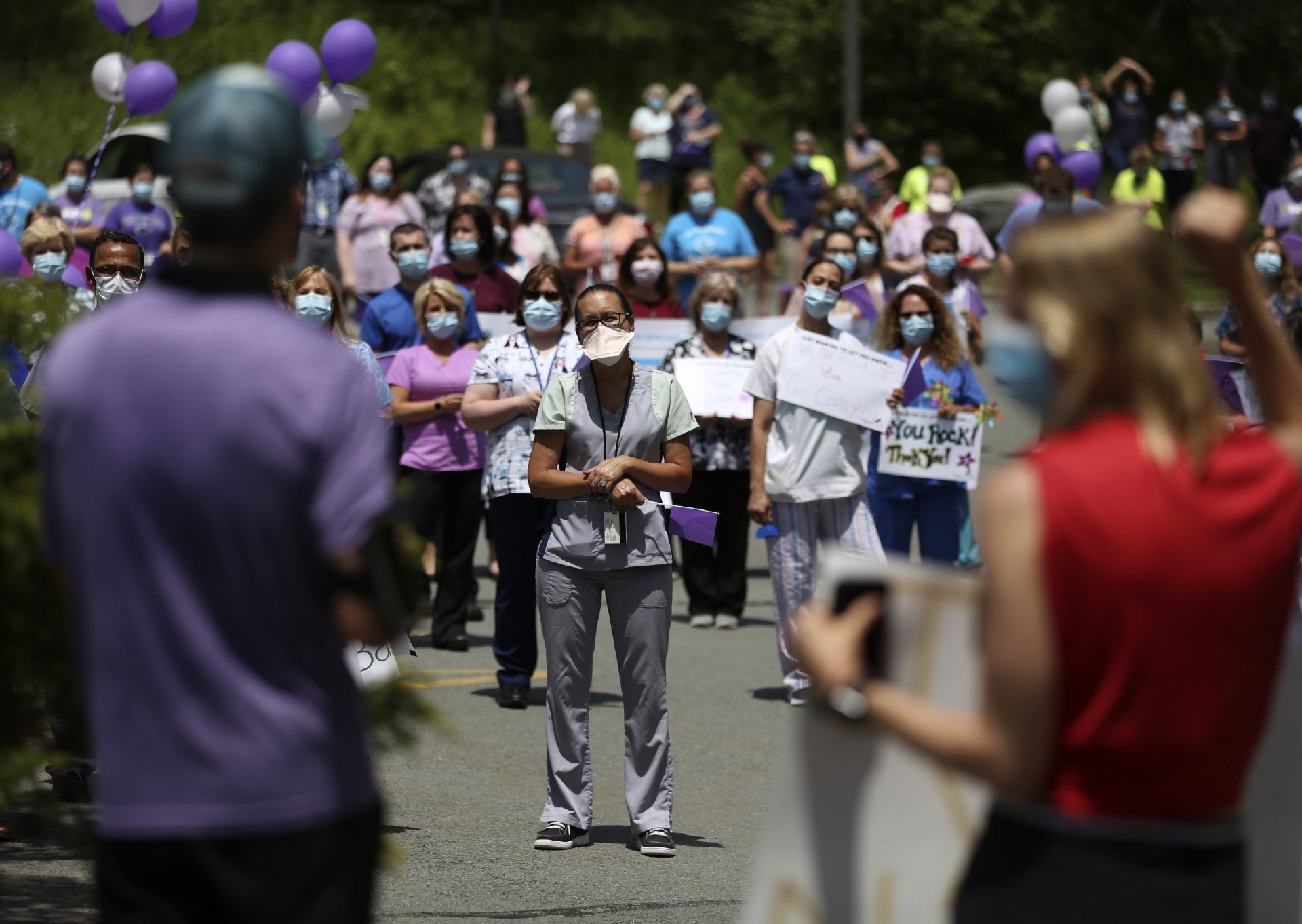 Corey Cappelloni thanks the staff of Allied Services Skilled Nursing & Rehab Center, where his 98-year-old grandmother is a resident, in Scranton, Pa., Friday, June 19, 2020.