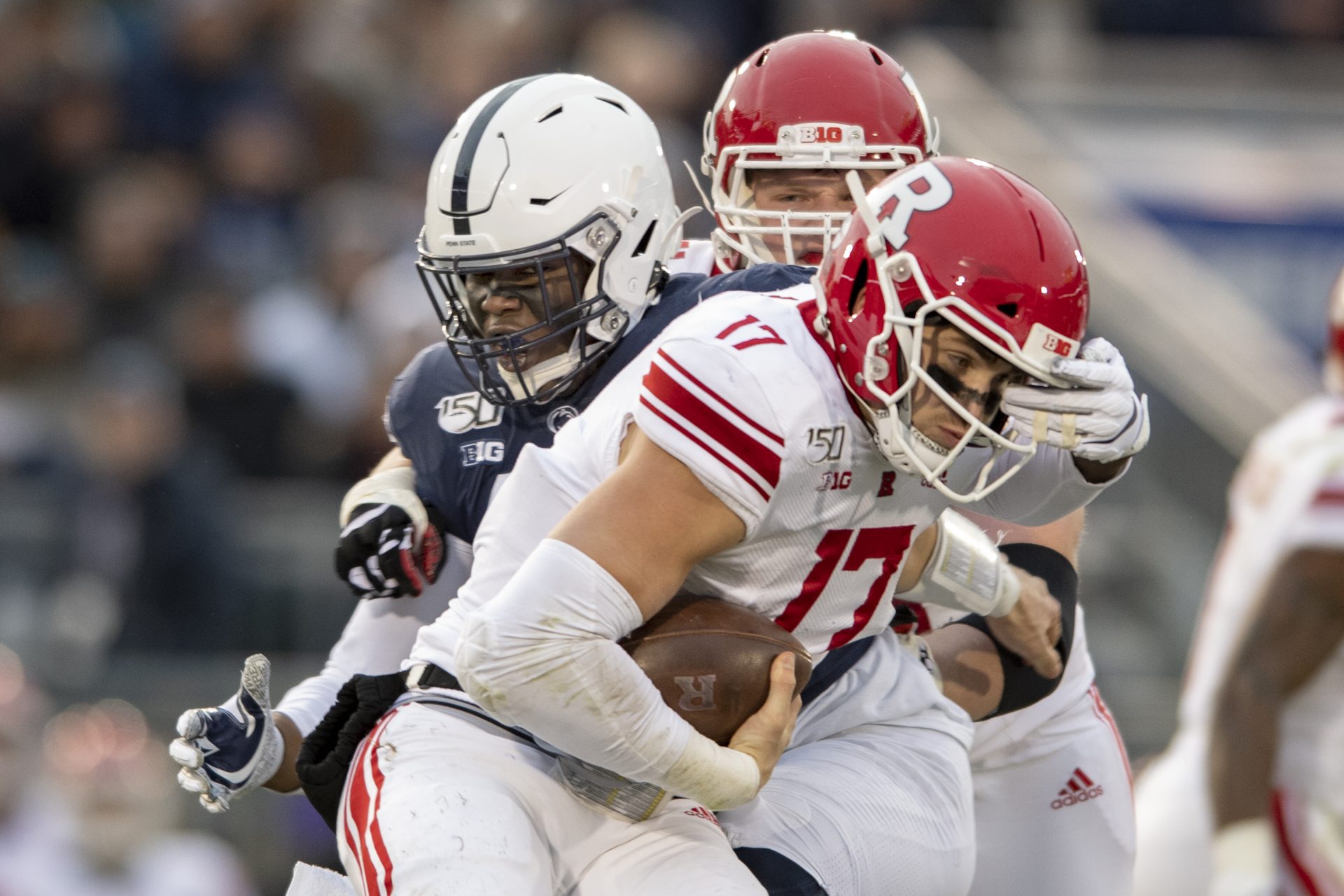 Penn State defensive end Daniel Joseph (49) sacks Rutgers quarterback Johnny Langan (17) in the second quarter of an NCAA college football game in State College, Pa., on Saturday, Nov. 30, 2019.