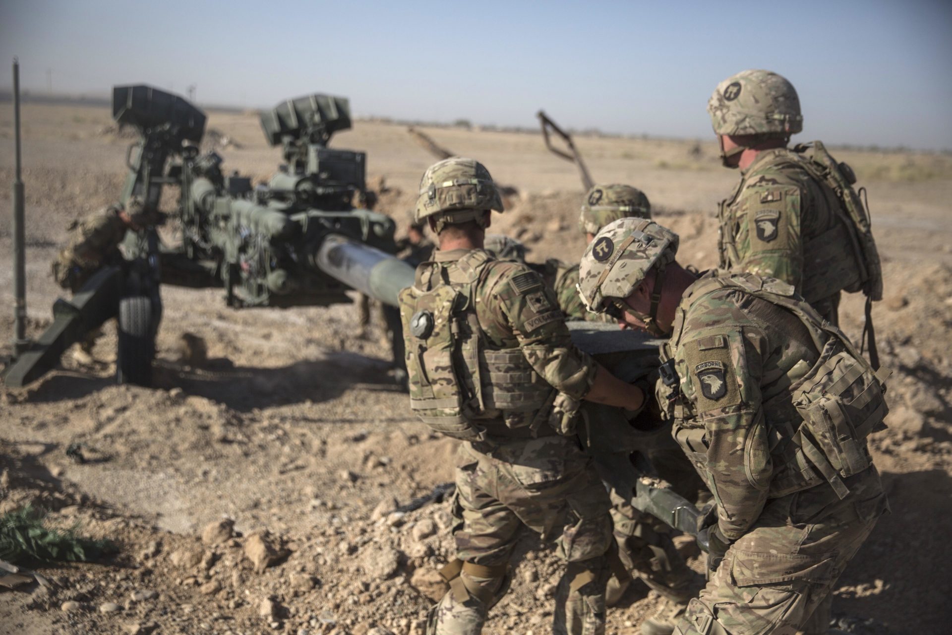 This June 10, 2017 photo provided by Operation Resolute Support, U.S. Soldiers with Task Force Iron maneuver an M-777 howitzer, so it can be towed into position at Bost Airfield, Afghanistan. Sixteen years into its longest war, the United States is sending another 4,000 troops to Afghanistan in an attempt to turn around a conflict characterized by some of the worst violence since the Taliban were ousted in 2001. They are also facing the emergence of an Islamic State group affiliate and an emboldened Taliban, who by Washington’s own watchdog’s assessment now control nearly half of Afghanistan.