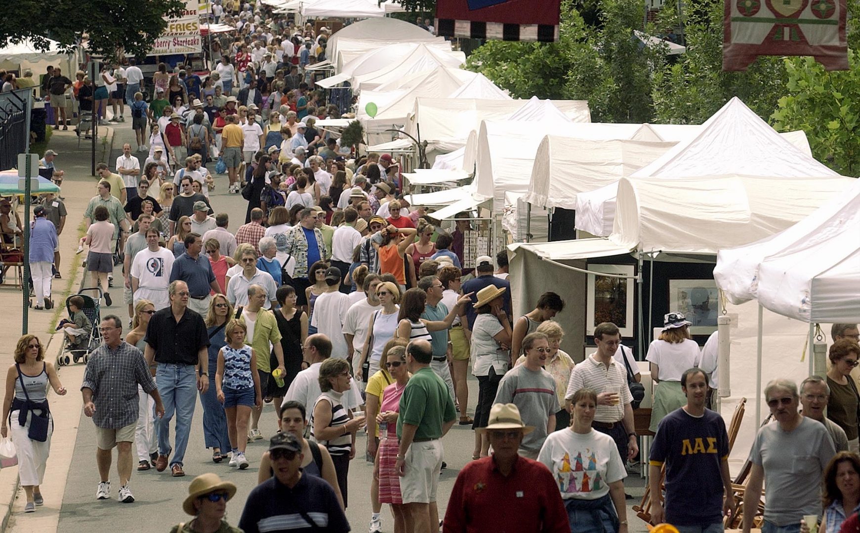 A crowded street at the Central Pennsylvania Festival of the Arts in State College, Pa. on Saturday, July 13, 2002. The festival ends on Sunday afternoon. (AP Photo/Pat Little)