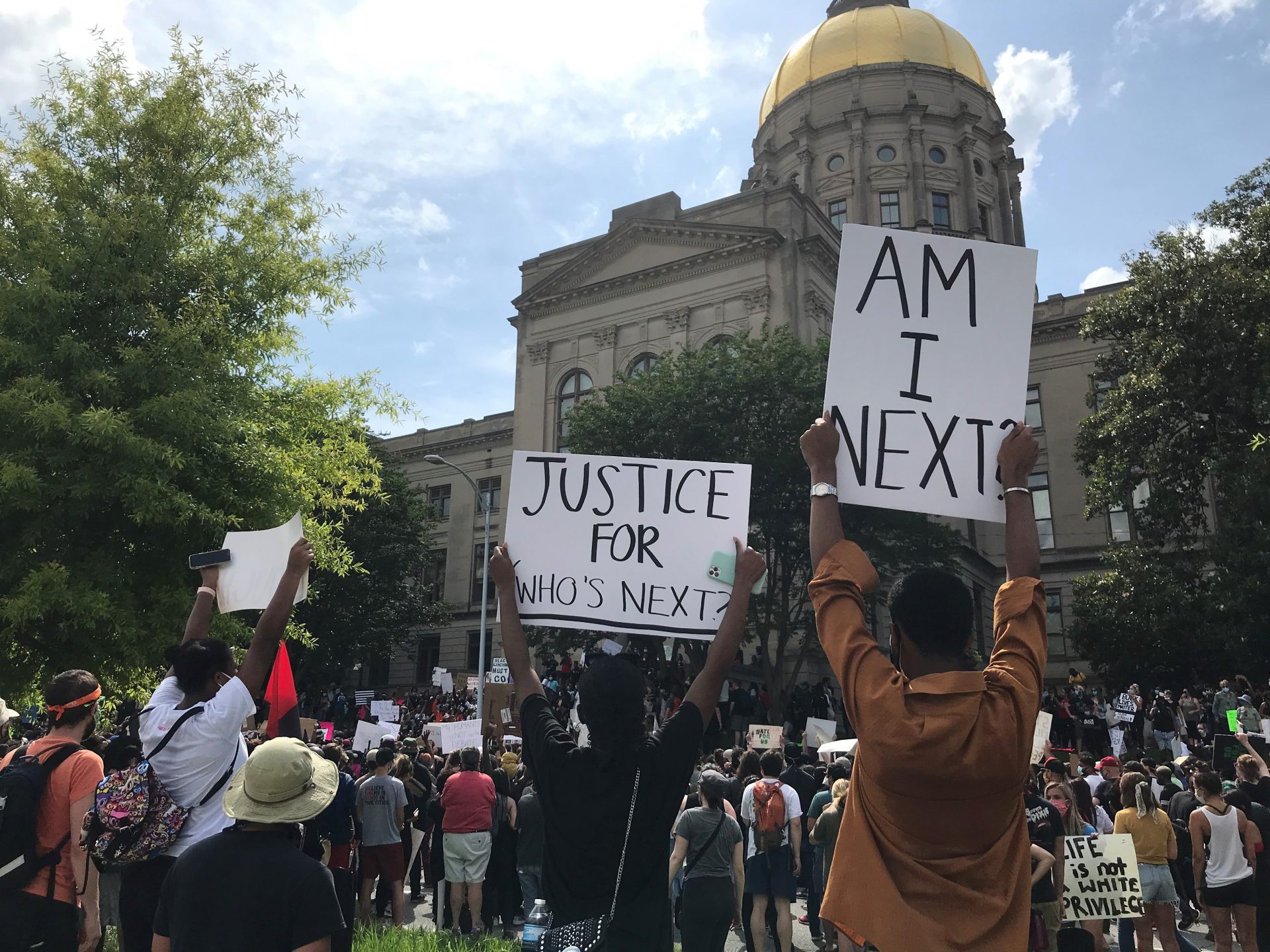 Demonstrators rally outside the Georgia capitol in early June protesting the death of George Floyd at the hands of police. Shortly after this wave of protests swept the nation, renewed calls came for something to be done with symbols of the confederacy, including the carving at Stone Mountain.