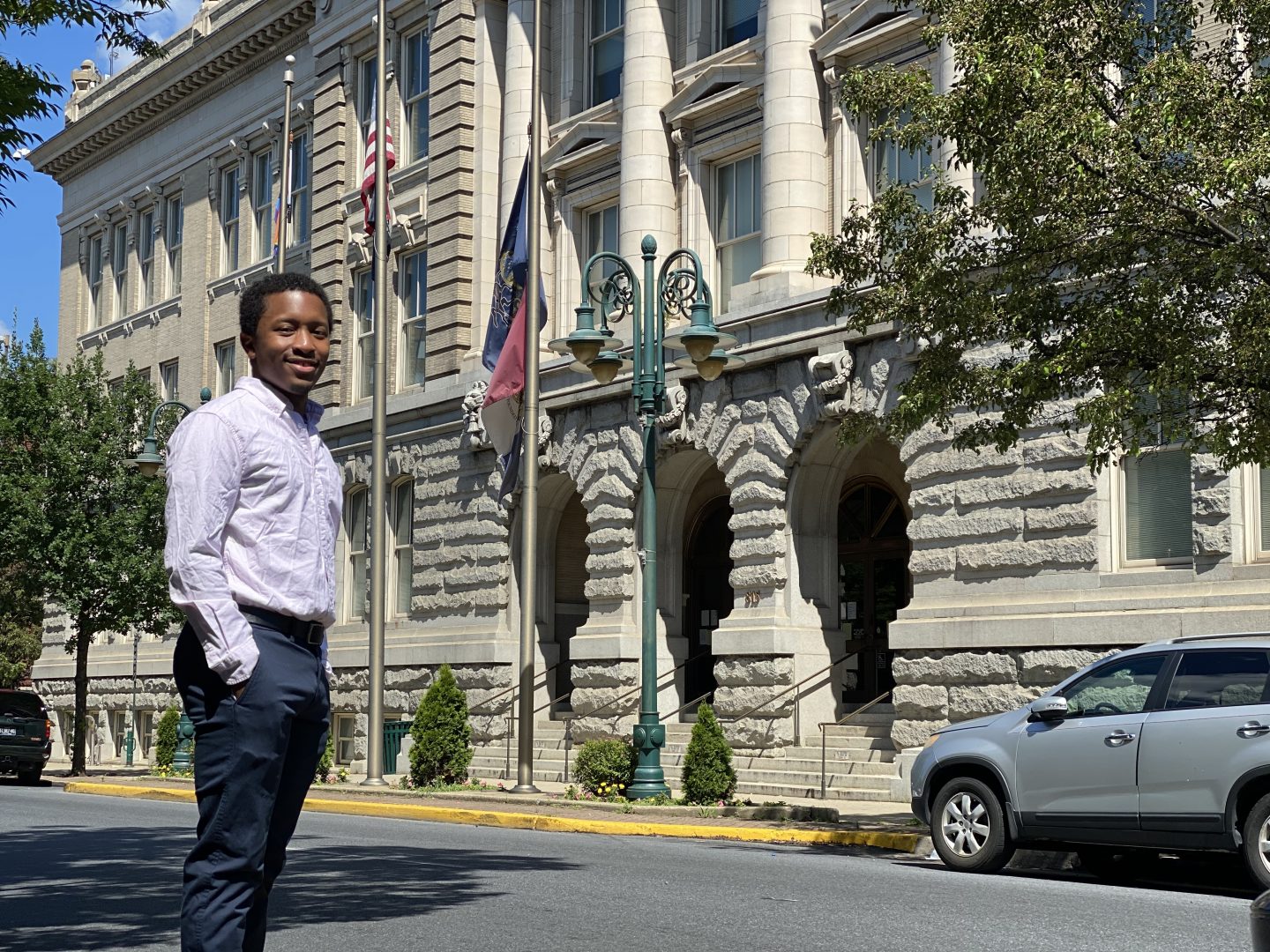 John Zabala, pictured in front of Reading City Hall, has been named as a community lead for the Reading Youth Commission. Too old to serve on the commission, Zabala is attracting applicants to the commission that has been dormant since its creation in 2017. (Anthony Orozco/PA Post) 