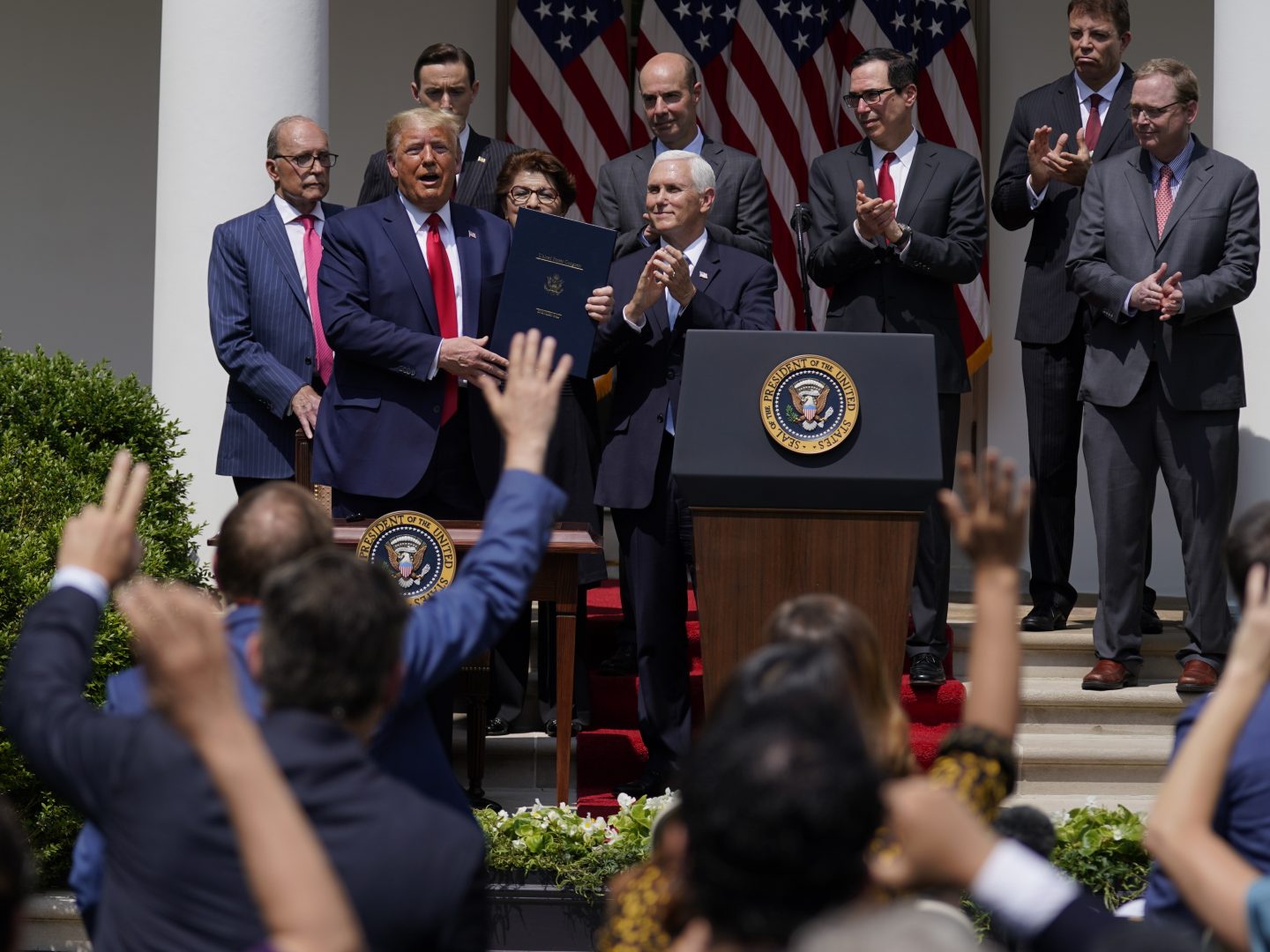 President Trump, pictured June 5, signs a bill extending the time period for businesses to use funds from the Paycheck Protection Program. On Saturday he signed a bill extending the deadline to apply for the program.
