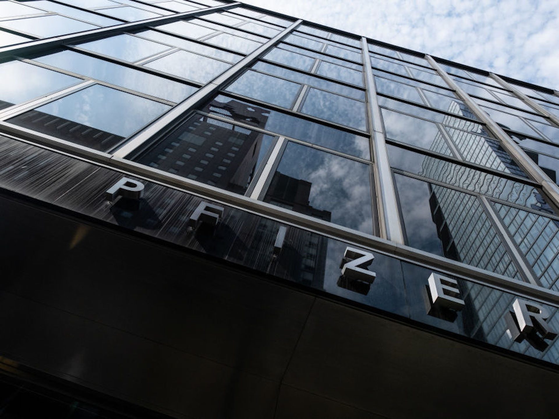 Pfizer Inc. headquarters stands in New York, U.S., on Wednesday, July 22, 2020. The agreement also would allow the federal government to acquire an additional 500 million doses of the Pfizer vaccine.