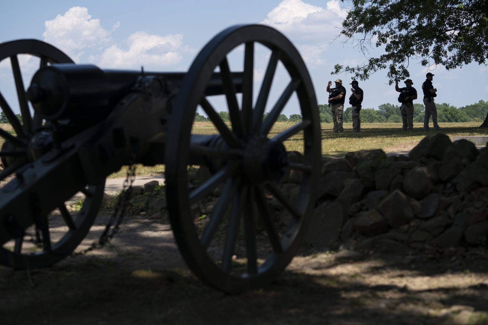 Members of a Department of Homeland Security police force stand guard at the North Carolina monument in the Gettysburg National Military Park Saturday, July 4, 2020 in Gettysburg.