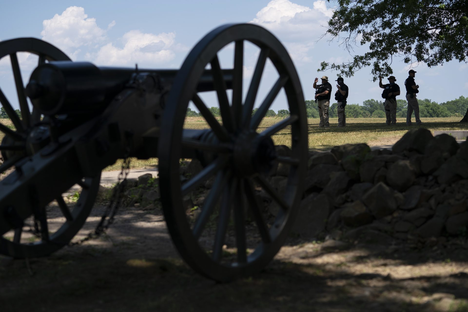 Members of a Department of Homeland Security police force stand guard at the North Carolina monument in the Gettysburg National Military Park Saturday, July 4, 2020 in Gettysburg,.