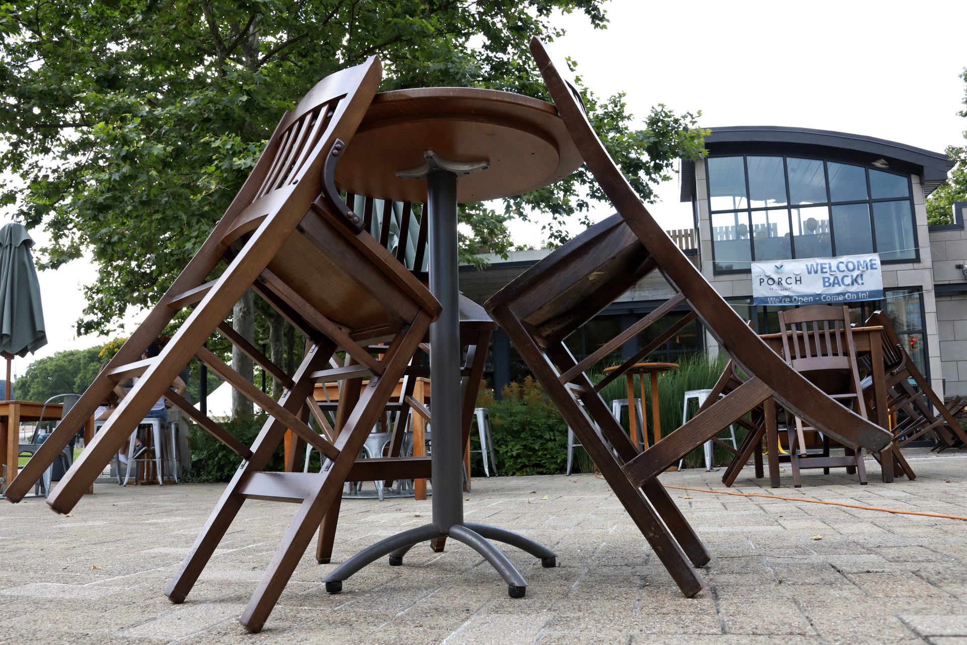 Tables and chairs outside the Porch restaurant in the Oakland neighborhood of Pittsburgh on Thursday, July 9, 2020, are ready as Pittsburgh-area restaurants prepare to reopen Friday for outdoor service only. Due to a spike in COVID-19 infections, in Allegheny County, service at restaurants has been limited to takeout for the past week.