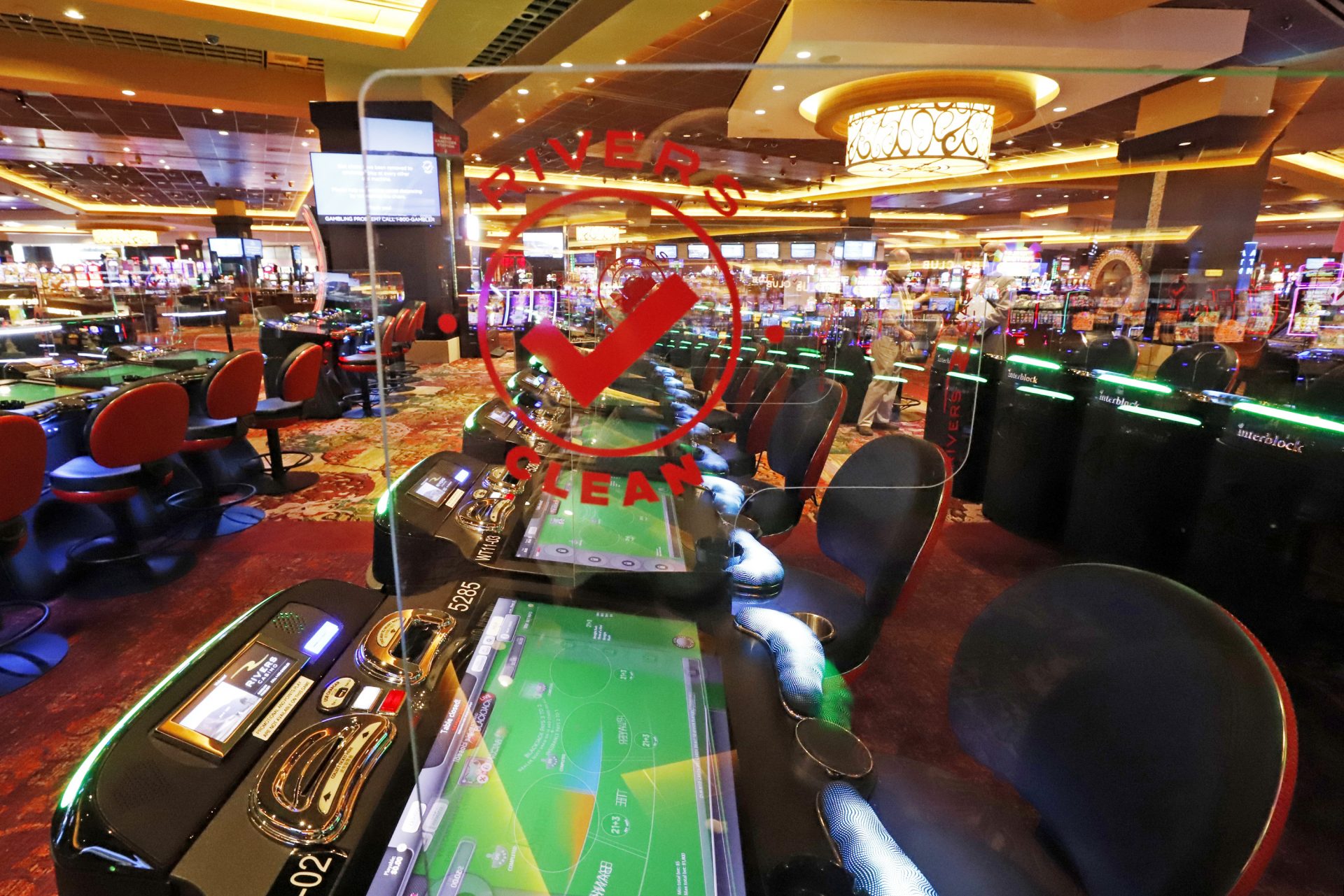 Plexiglas dividers separate video gaming machines at Rivers Casino in Pittsburgh on Monday, June 8, 2020. The casino is scheduled to re-open at 9 a.m. Tuesday, operating at 50% capacity to comply with Pennsylvania Gaming Control Board COVID-19 protocols.